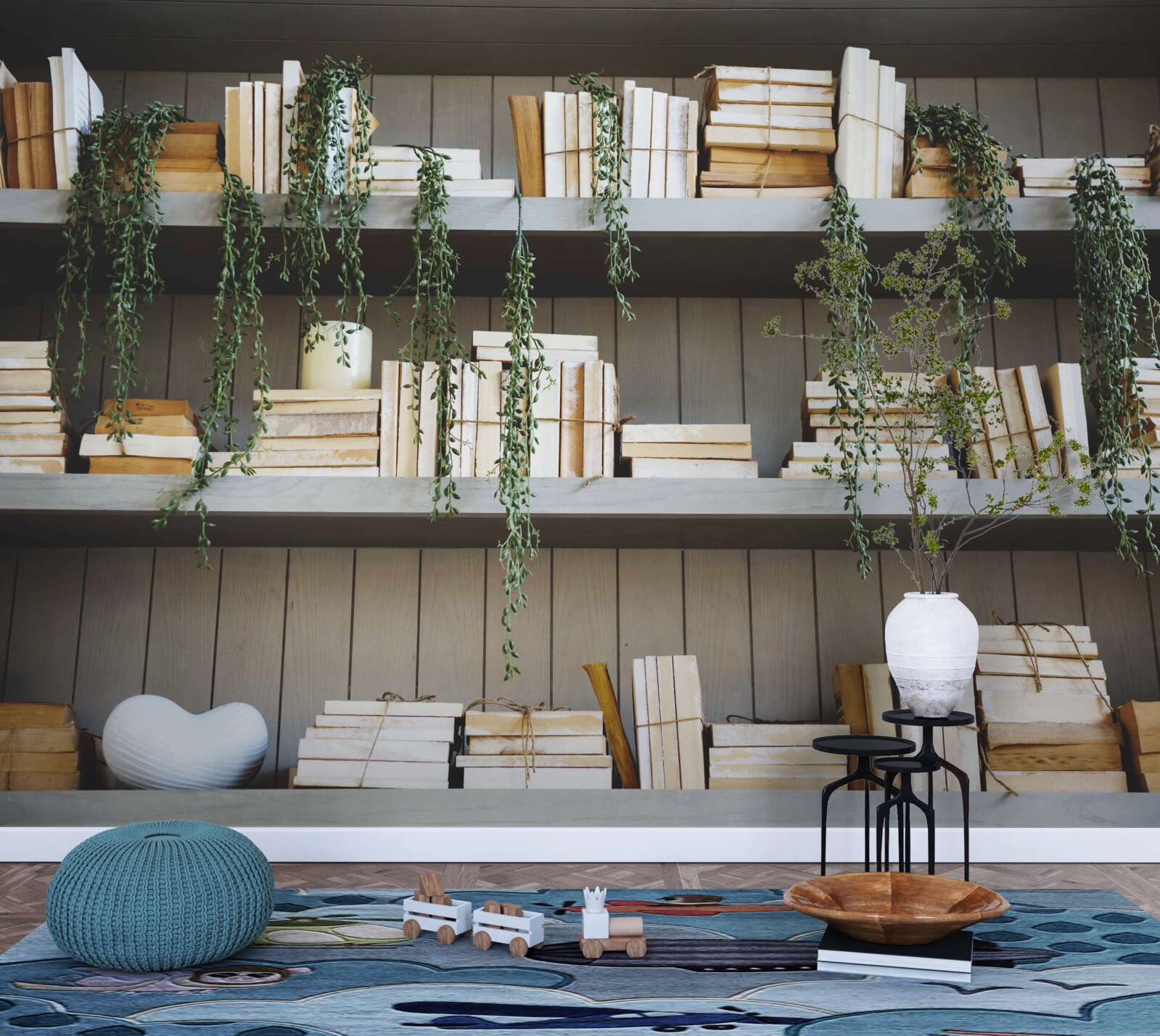 Fotobehang planken met boeken en groene planten creëren een gezellige sfeer