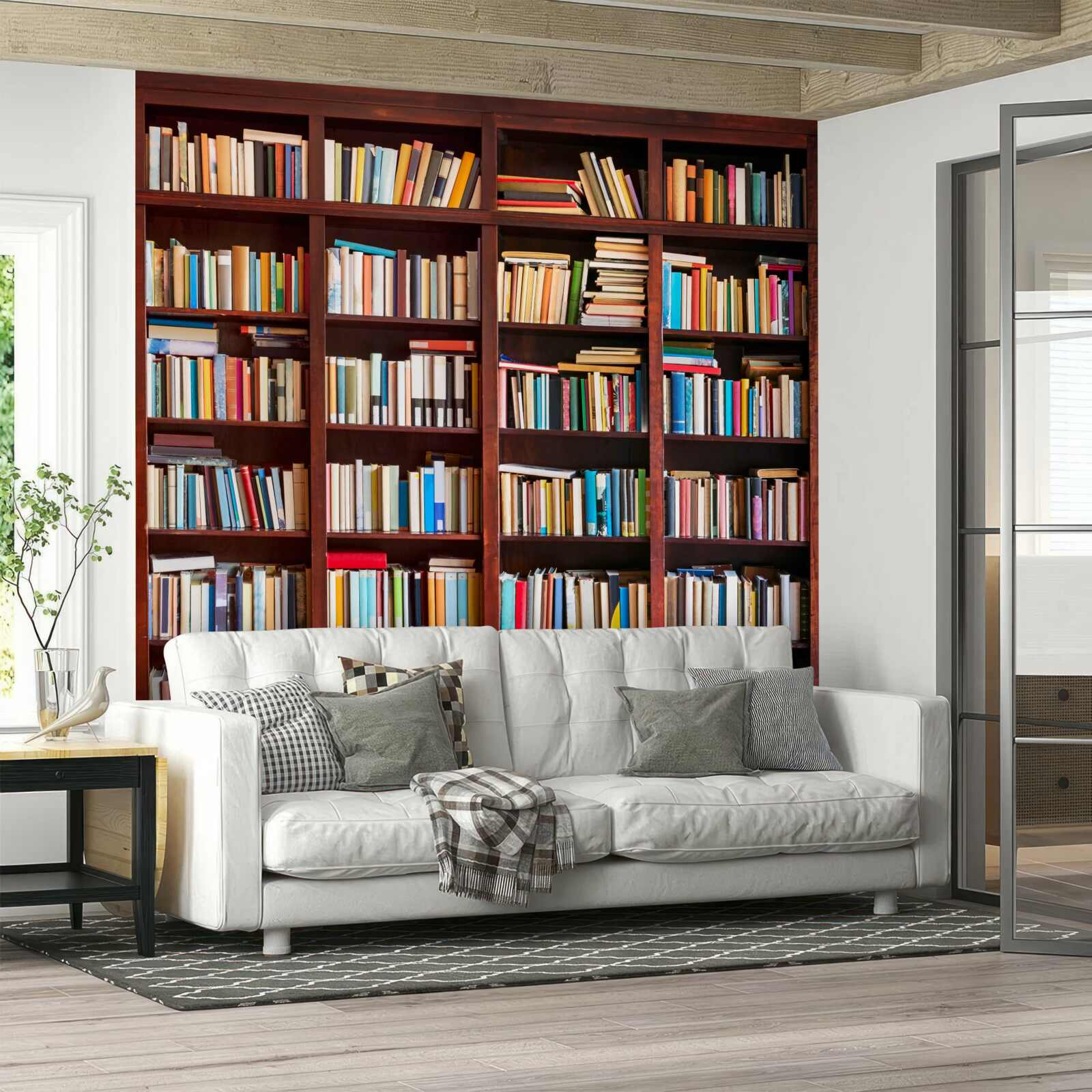 Fotobehang rijen boeken in verschillende kleuren op de planken