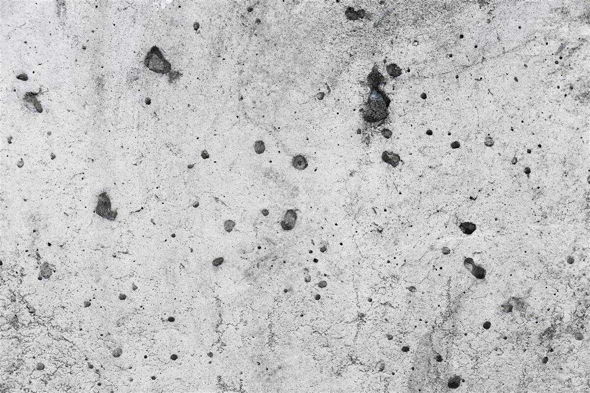 Fotobehang betonnen muur met donkere vlekken