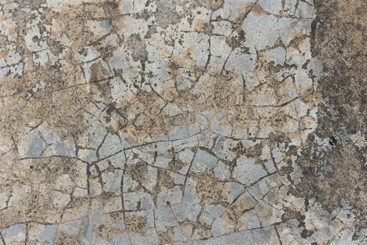 Fotobehang marmeren oppervlak, bezaaid met barsten