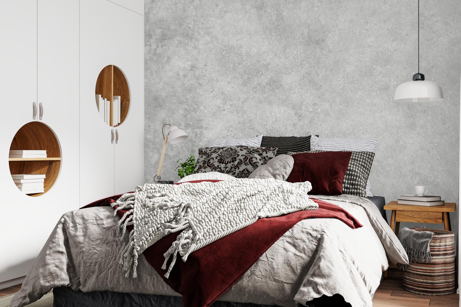 Fotobehang De muur is gemaakt van beton in een lichtgrijze tint