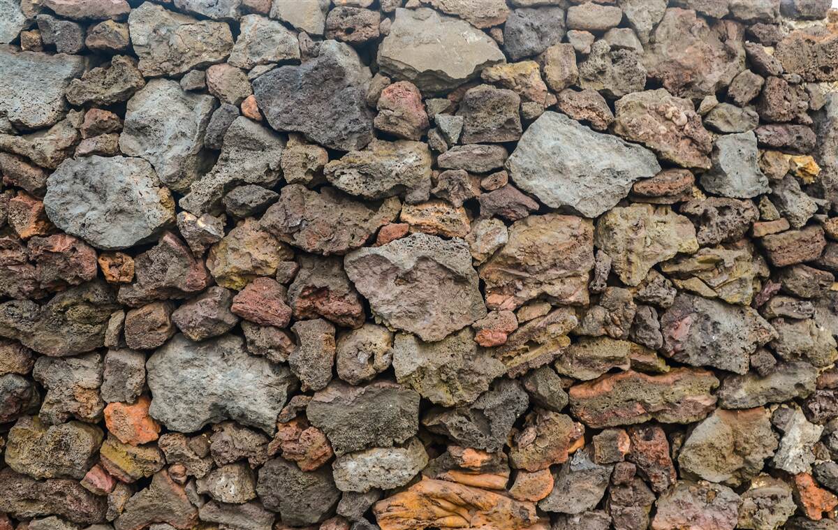 Fotobehang Vulkanische stenen muur