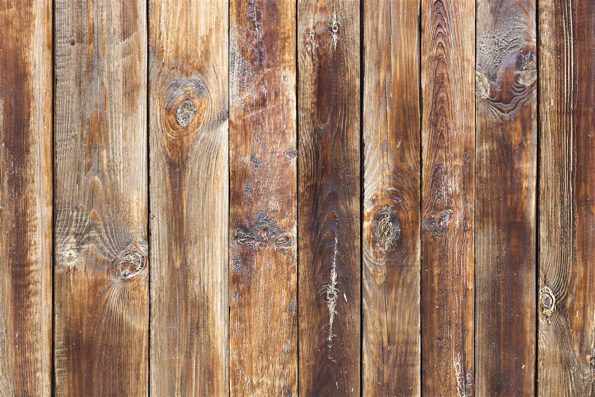 Fotobehang de balken zijn gemaakt van donkerbruin hout