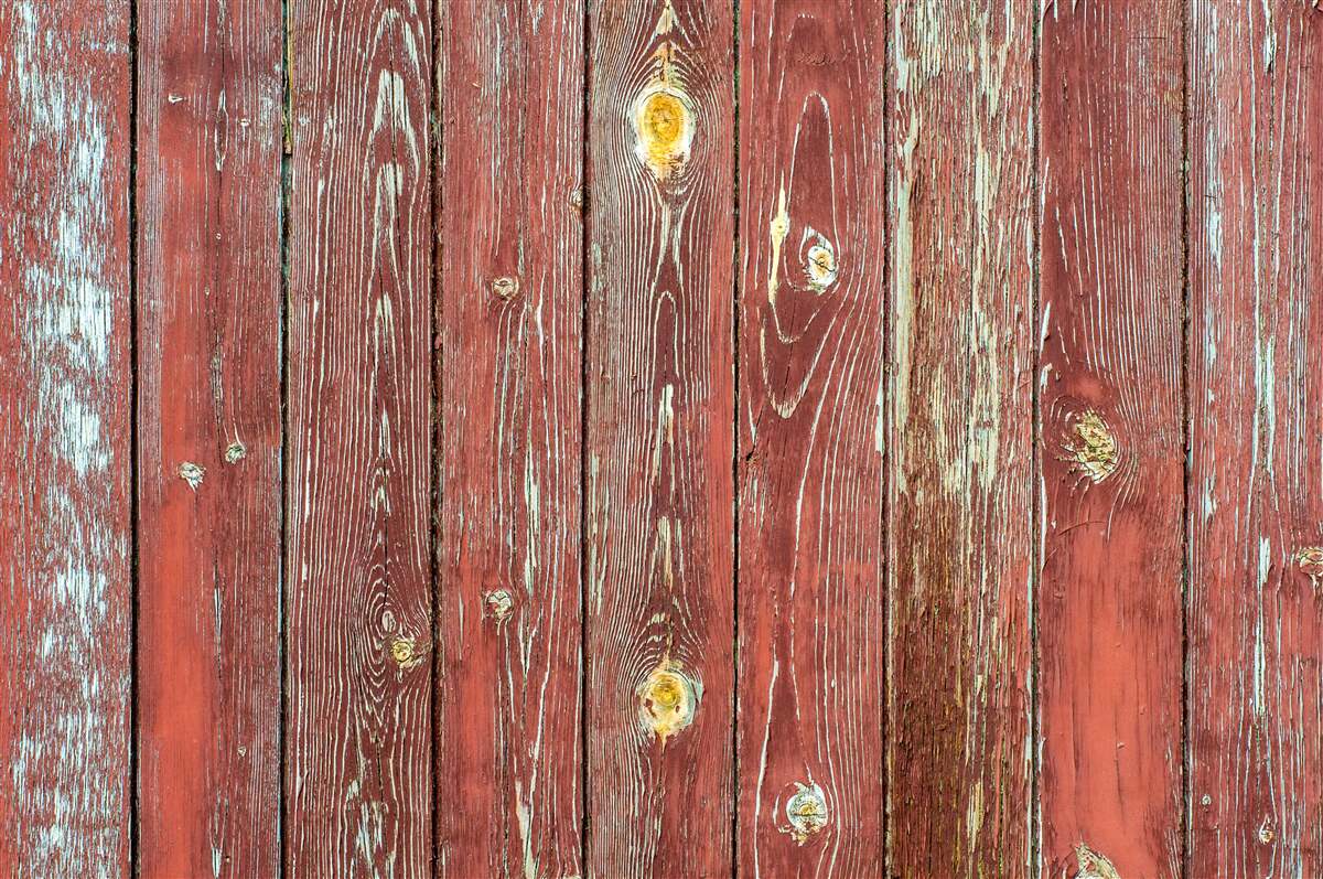 Fotobehang de houten achtergrond is rood en heeft een antieke uitstraling