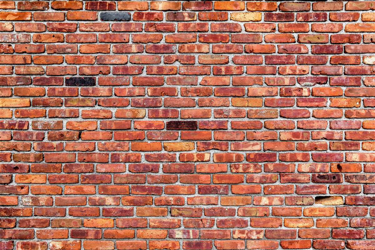 Fotobehang Antieke bakstenen muur