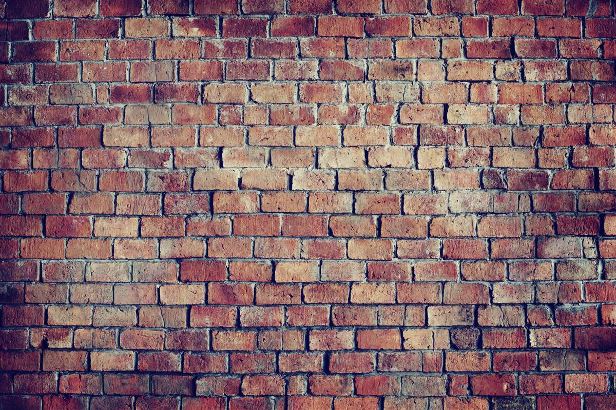Fotobehang Rode bakstenen muur