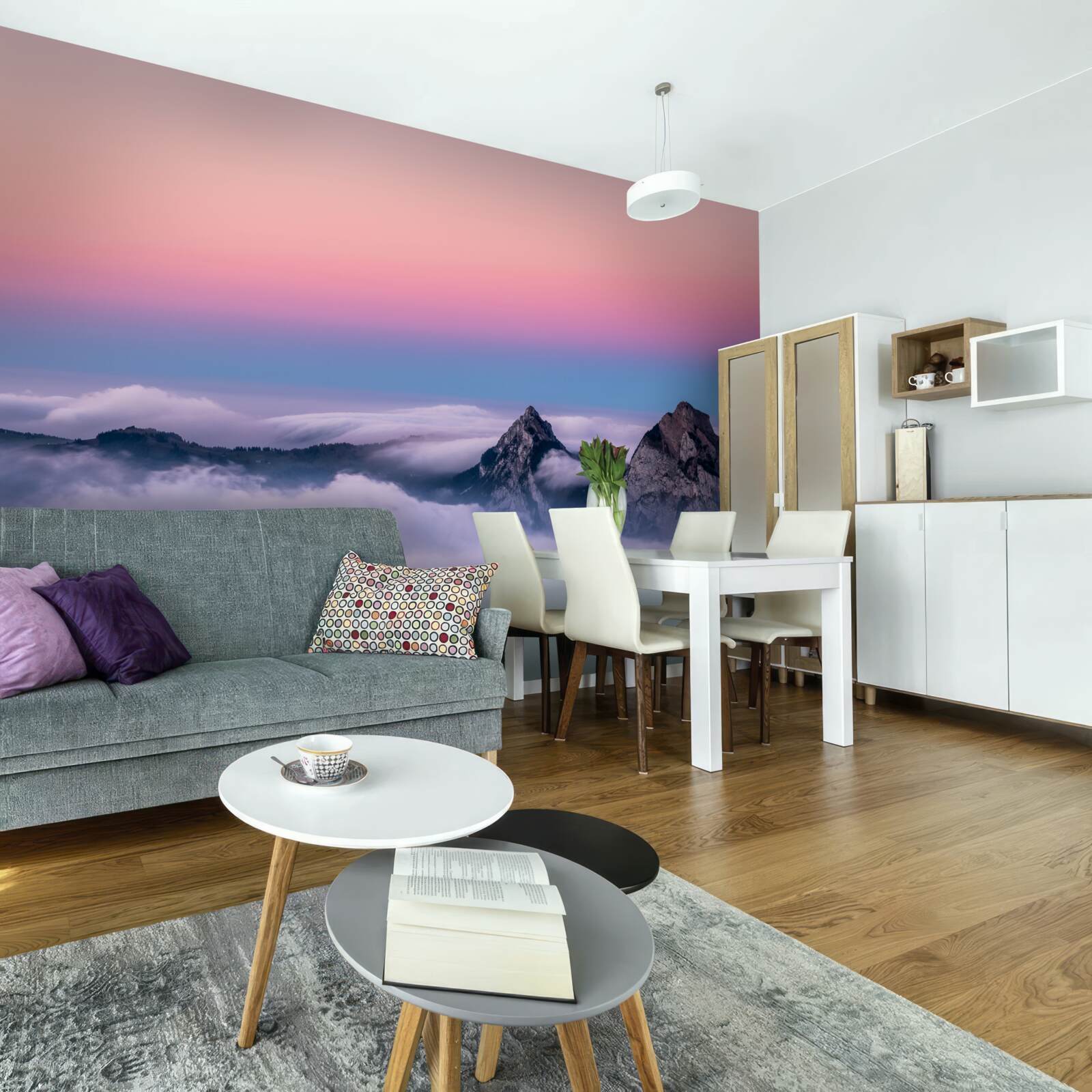 Fotobehang wolkentoppen onder een roze hemel