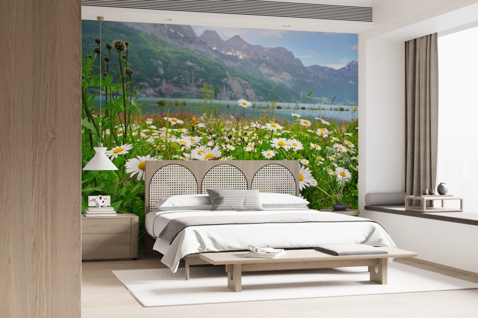 Fotobehang landschap met kamilleveld aan de voet van de bergen