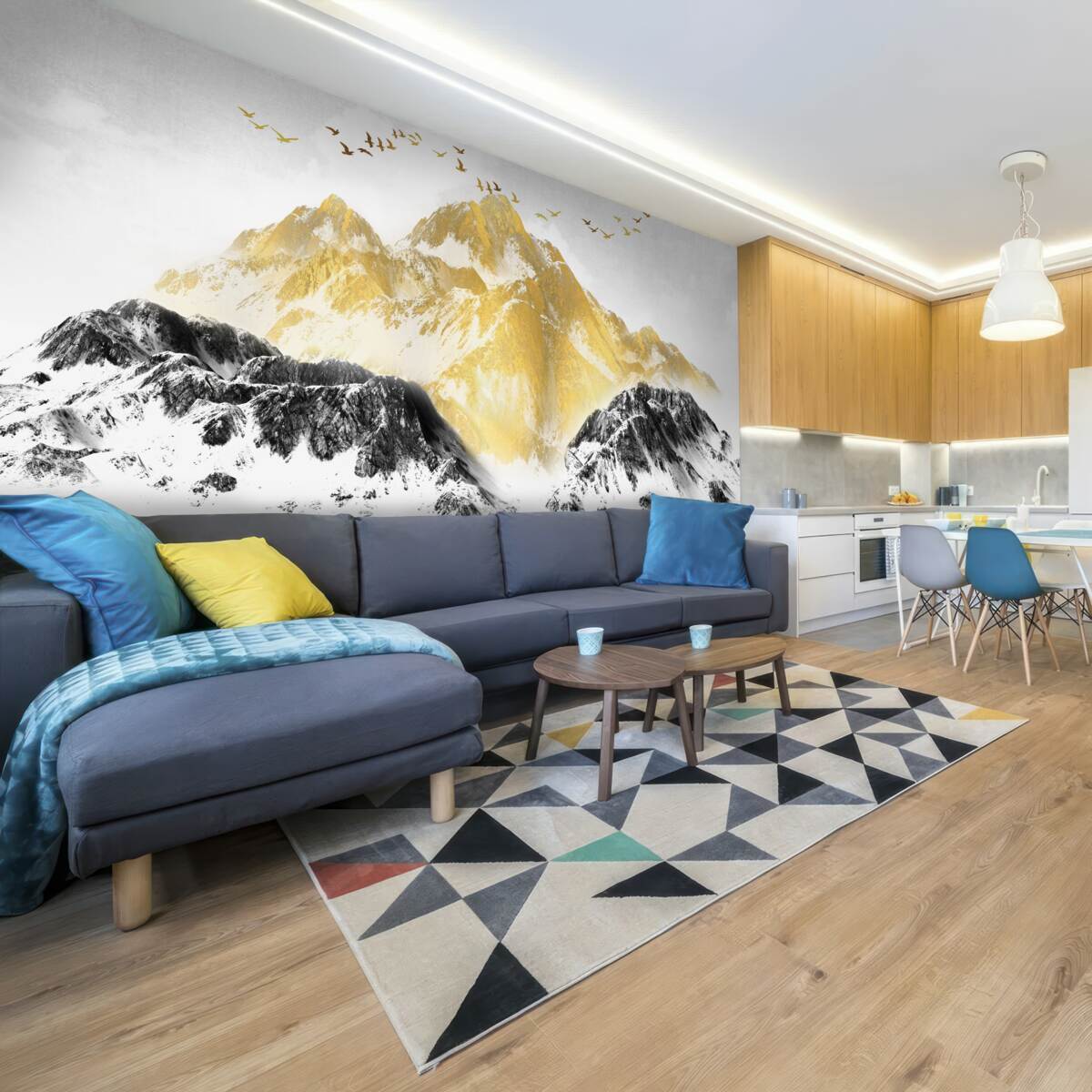 Fotobehang bergketens met gouden toppen