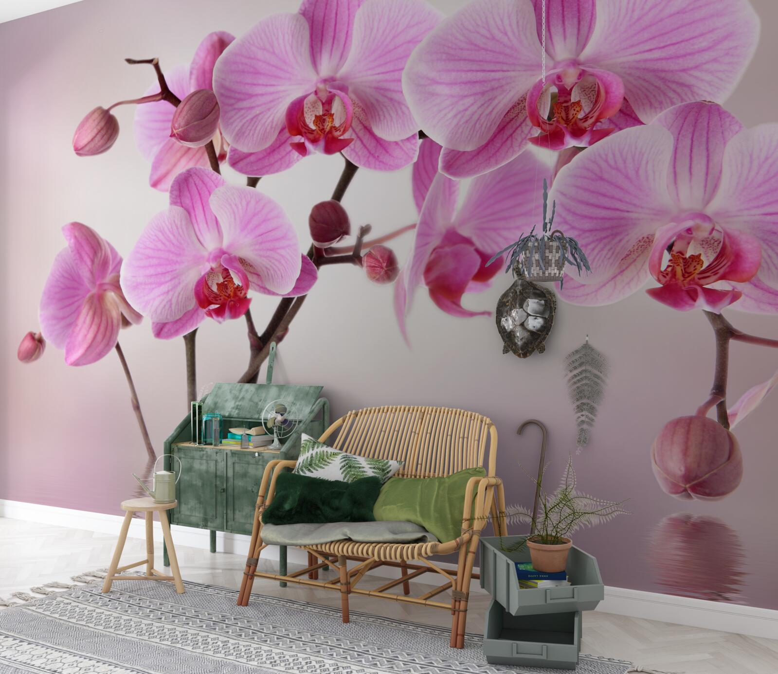 Fotobehang boven het water hangen de takken van een lila orchidee