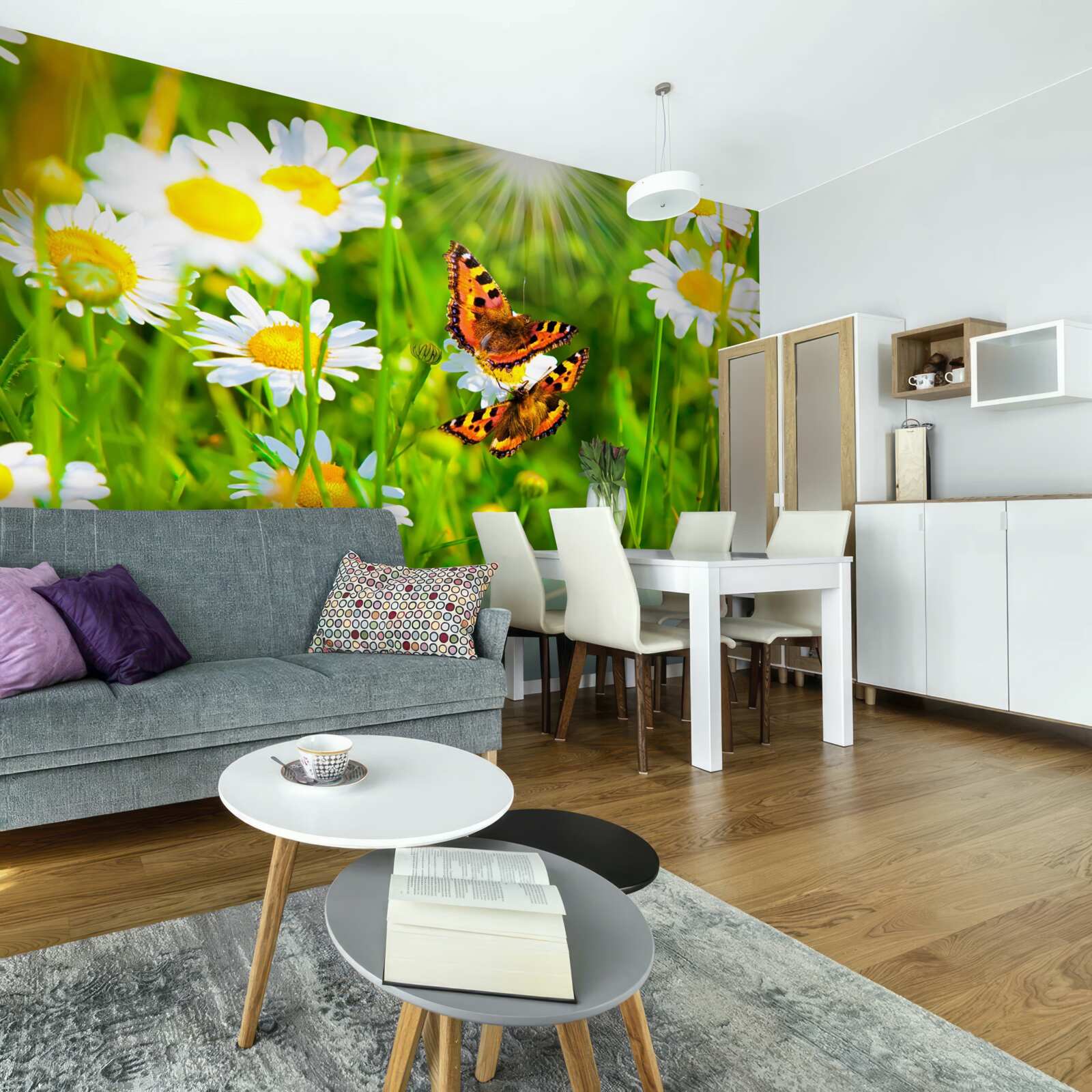 Fotobehang kamille in een veld bezaaid met vlinders