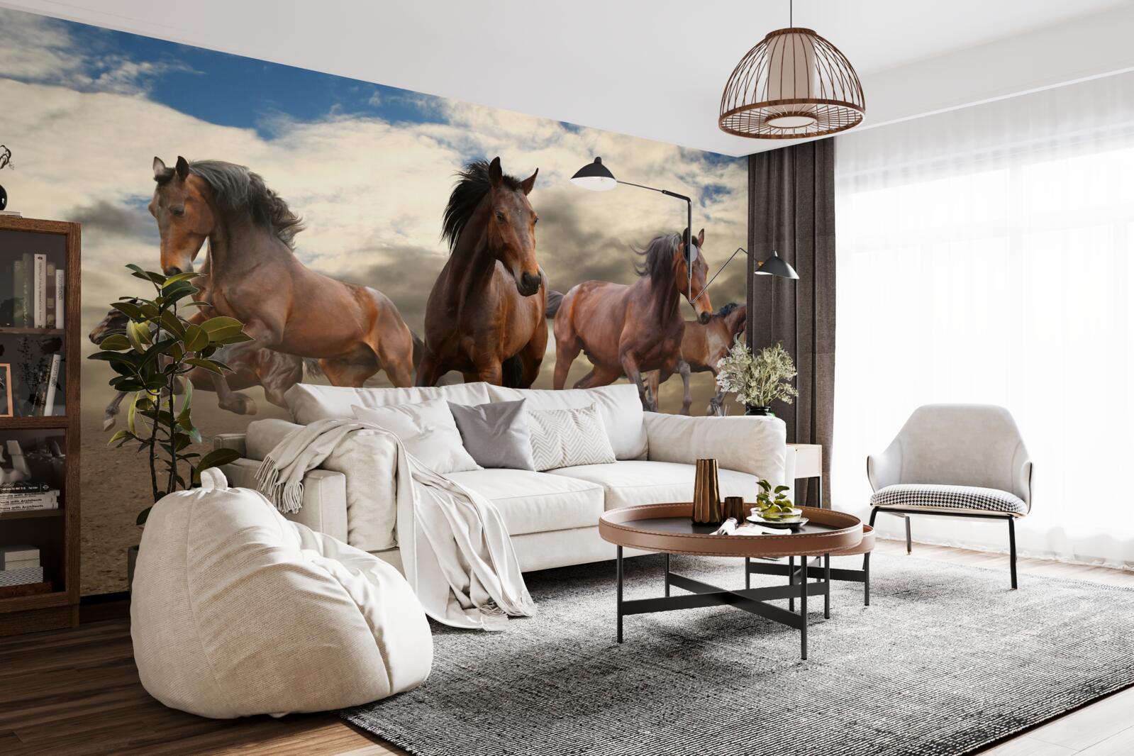 Fotobehang een groep bruine paarden die over de grond rennen