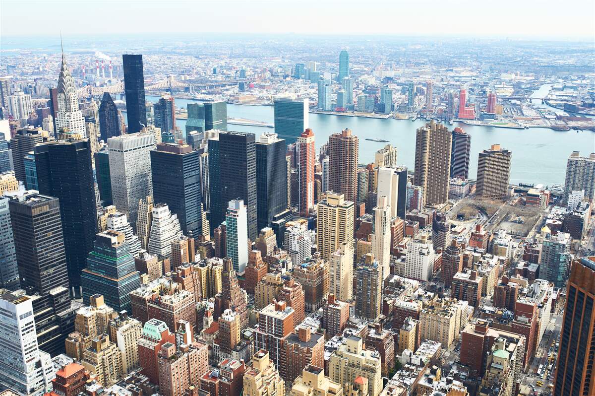 Fotobehang de gebouwen van new york en hun daken
