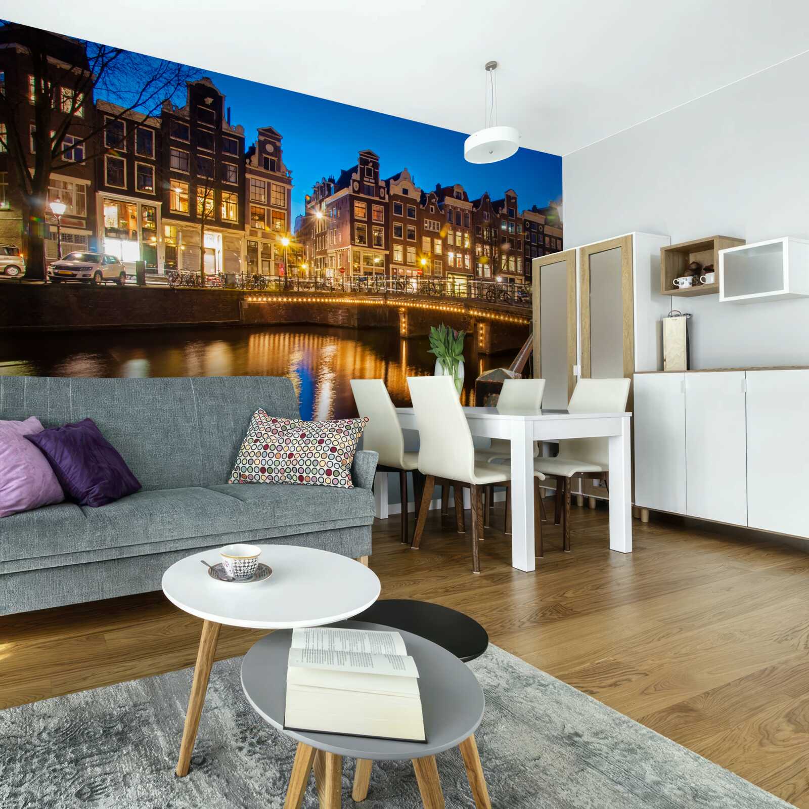 Fotobehang weerspiegeling van amsterdam in het water bij nacht