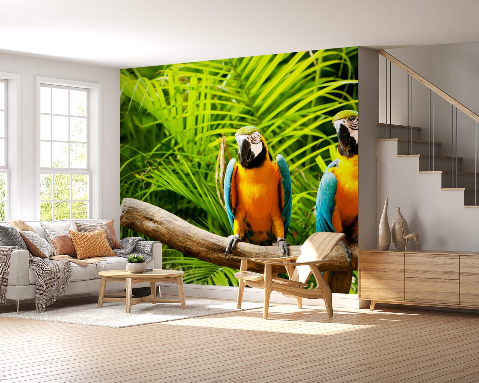 Fotobehang ara papegaaienfamilie op een tak omringd door groen