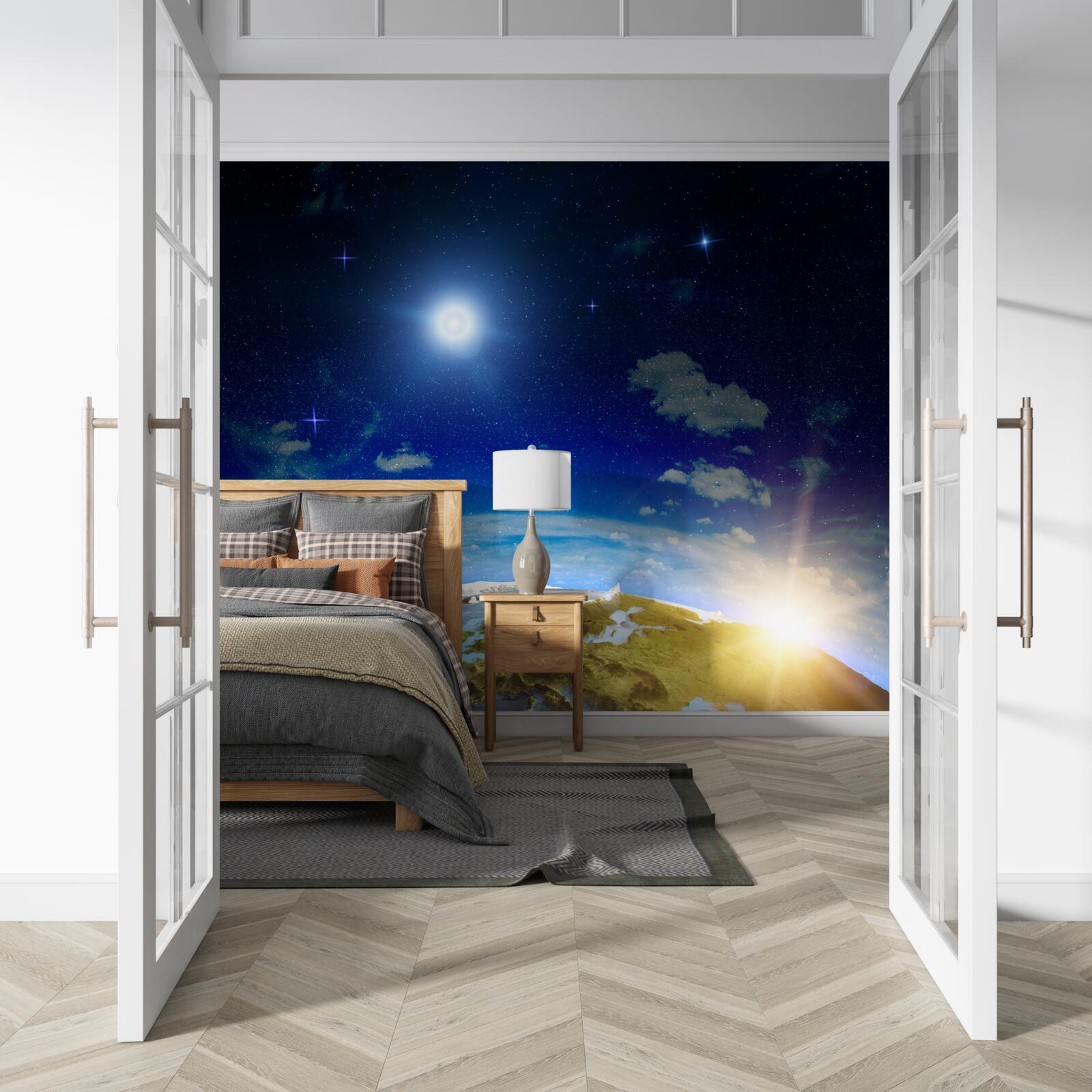 Fotobehang de zon die opkomt boven de planeet