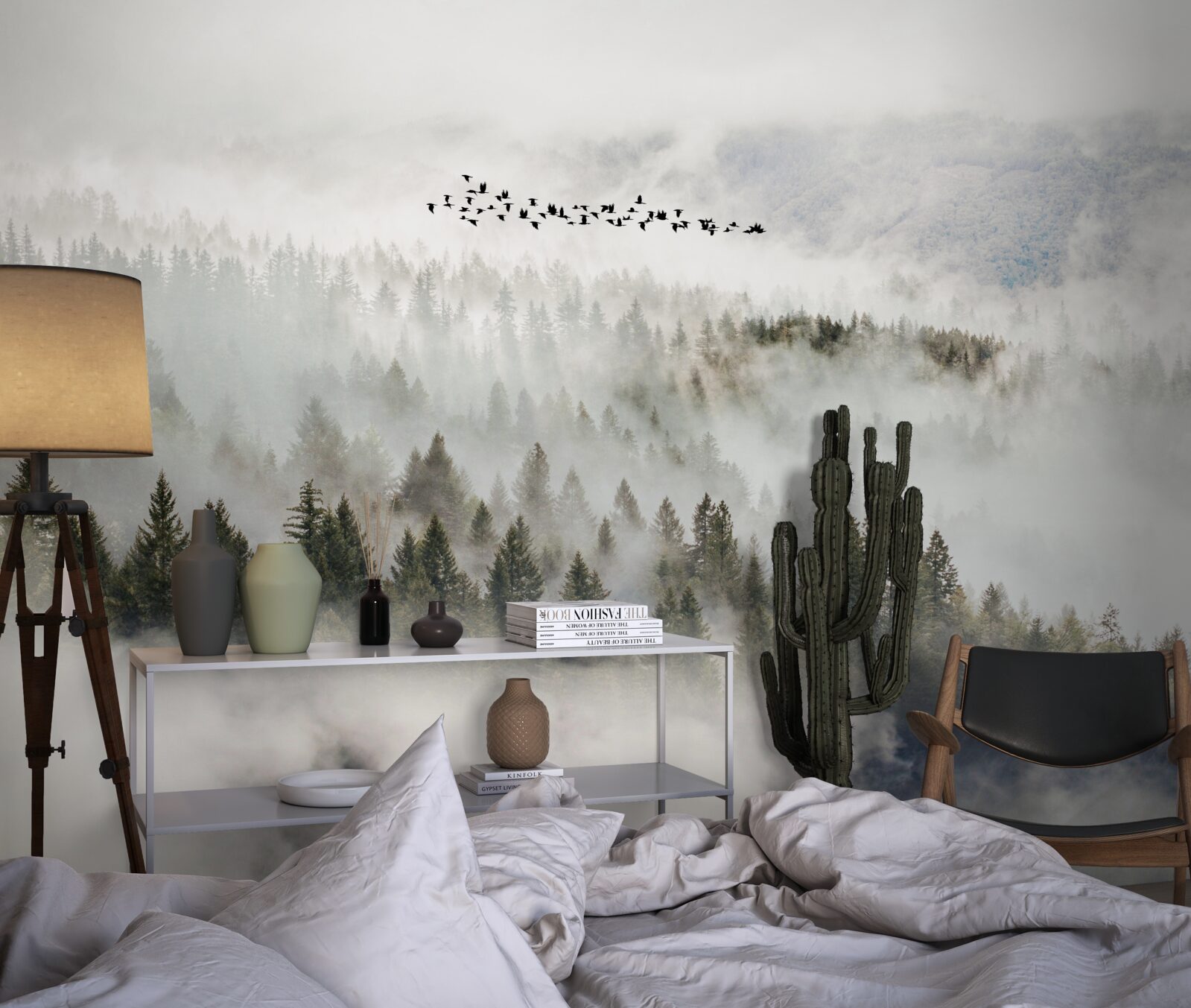 Fotobehang een groep vogels hoog boven een bewolkt berggebied