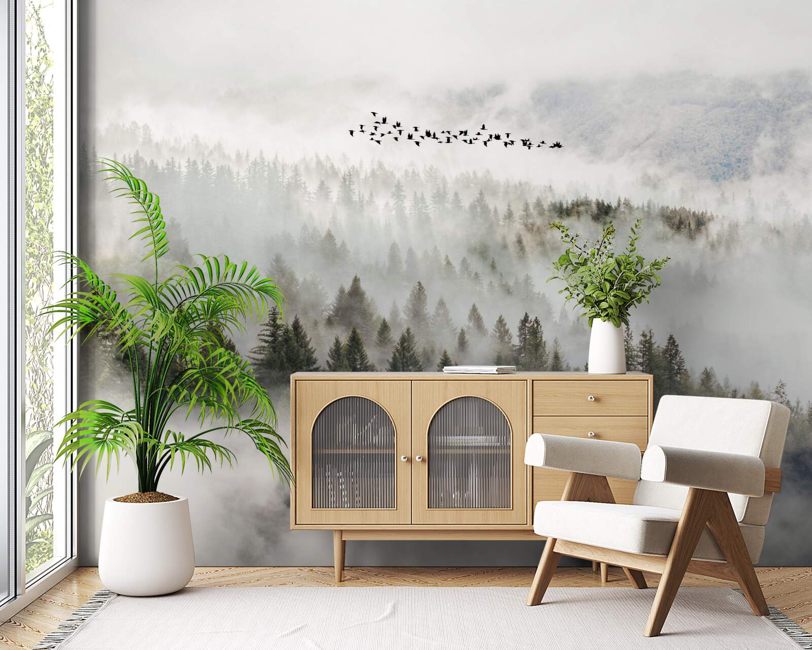 Fotobehang een groep vogels hoog boven een bewolkt berggebied