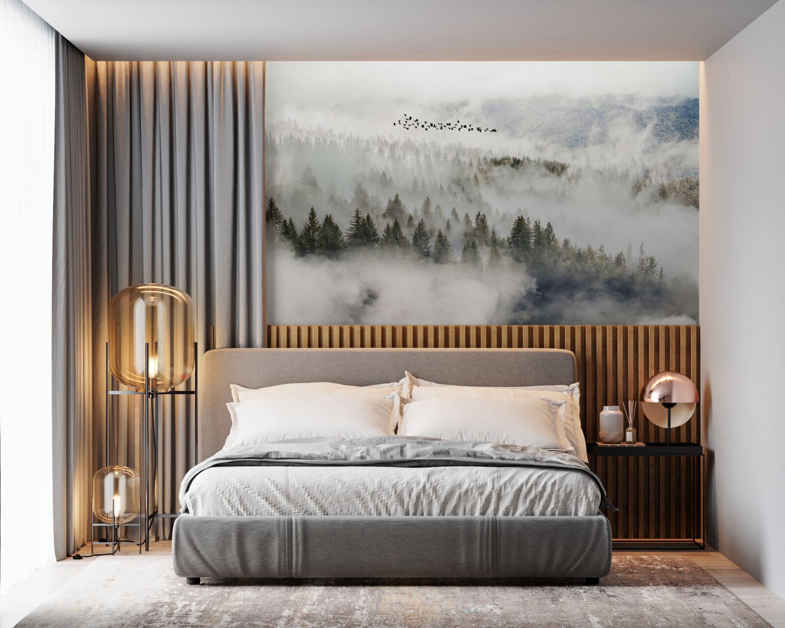 Fotobehang een groep vogels hoog boven een bewolkt berggebied