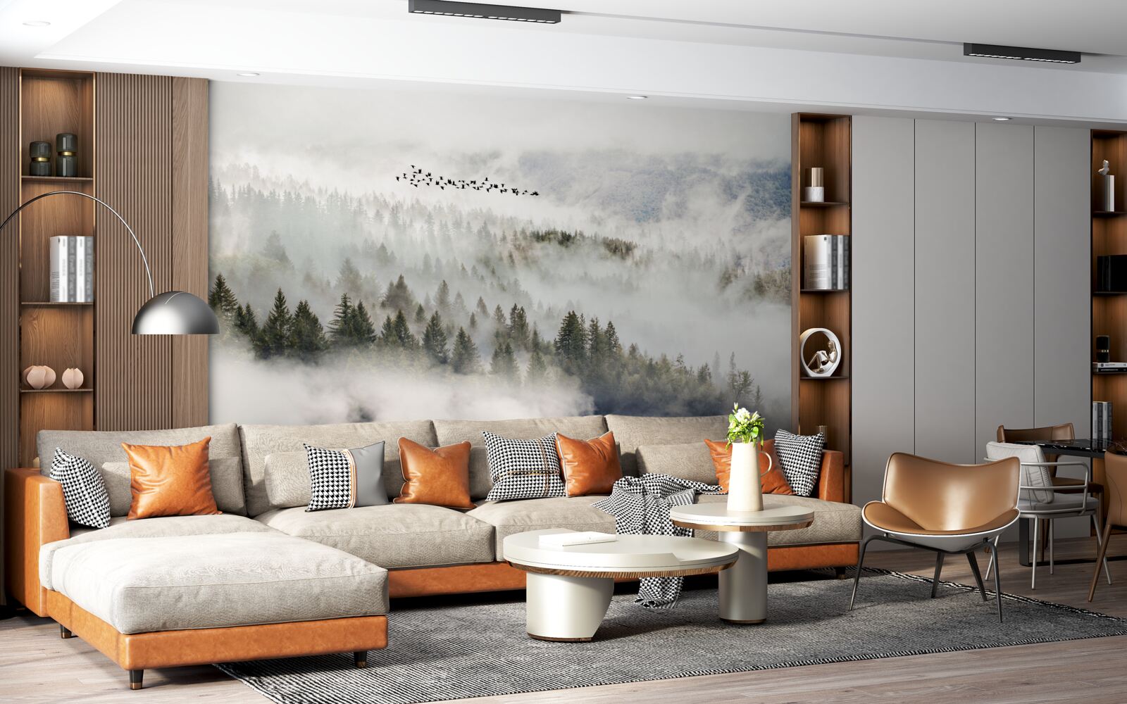 Fotobehang een groep vogels hoog boven een bewolkt berggebied