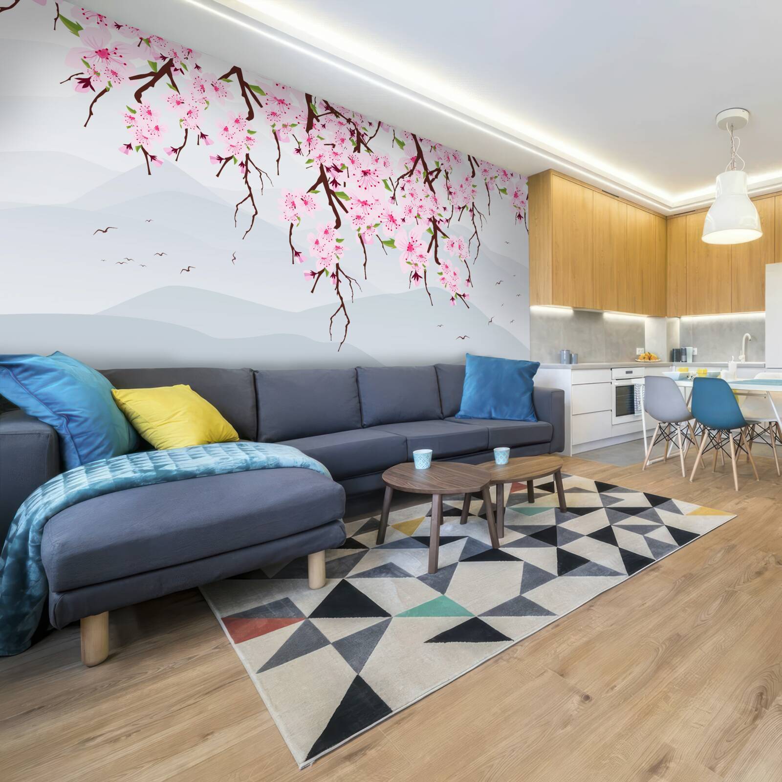 Fotobehang bloeiende sakura voor een landschap van bergen en water