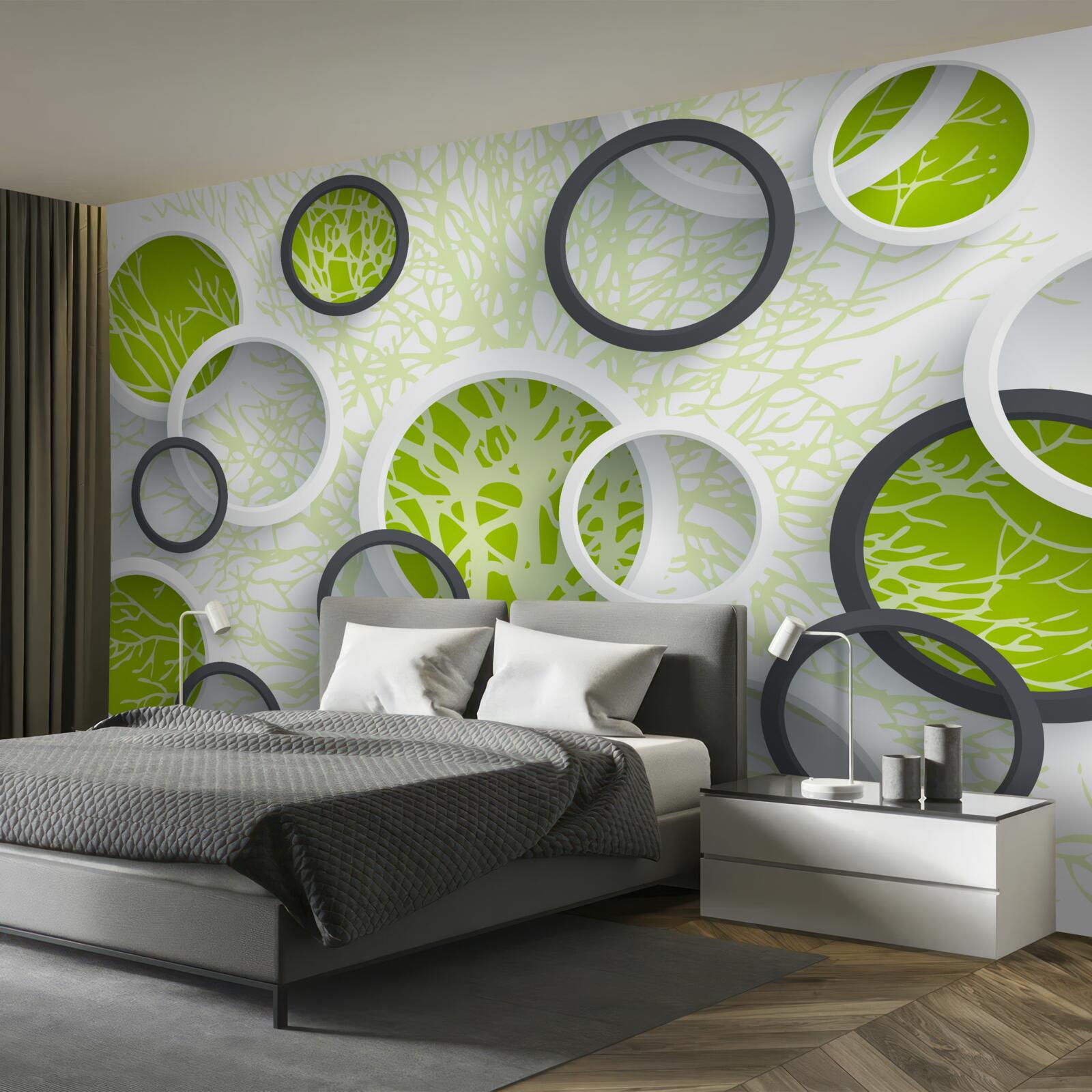 Fotobehang de cirkels van de lens weerspiegelen het groen van de boombladeren