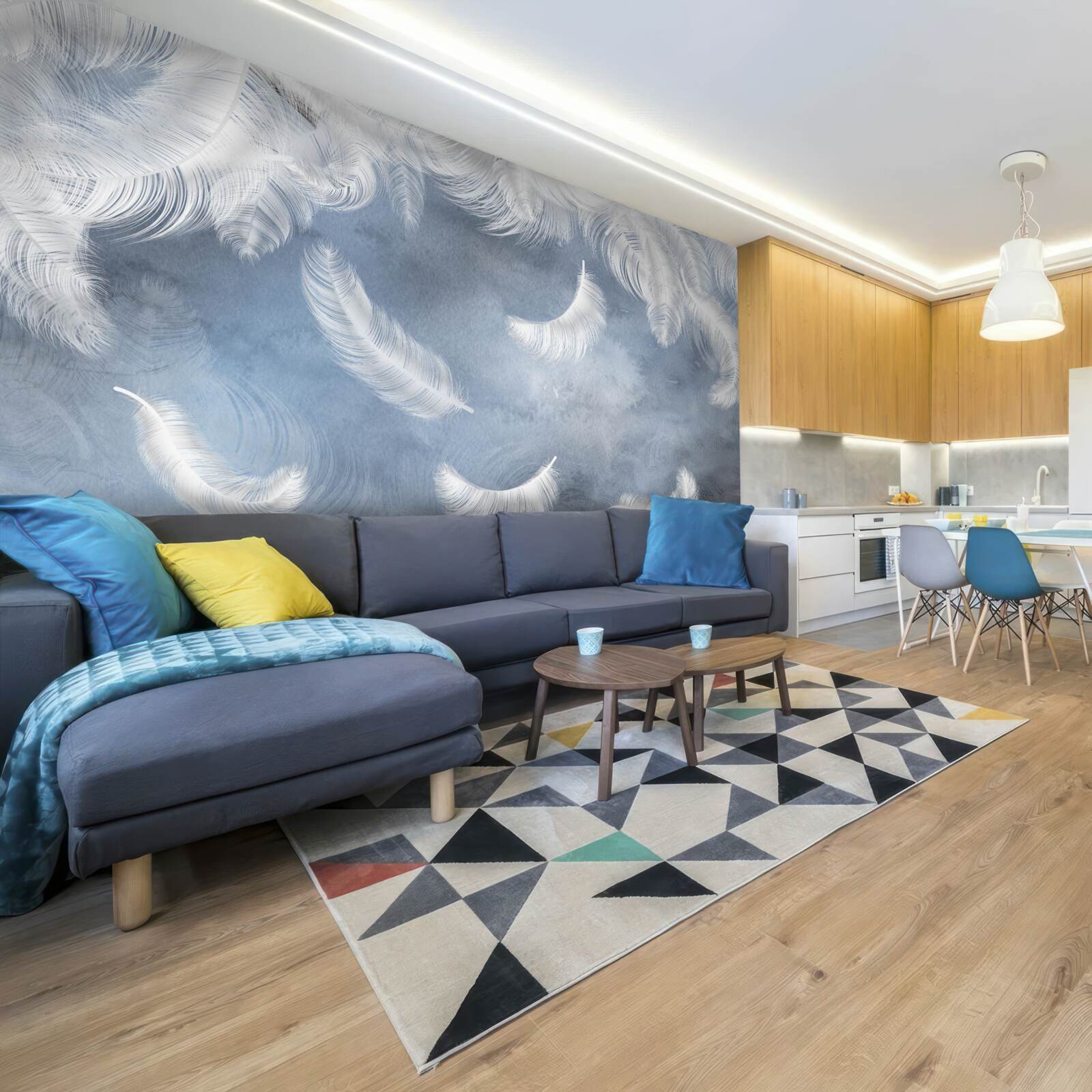 Fotobehang veren vliegen sneeuwwit tegen een blauwe lucht