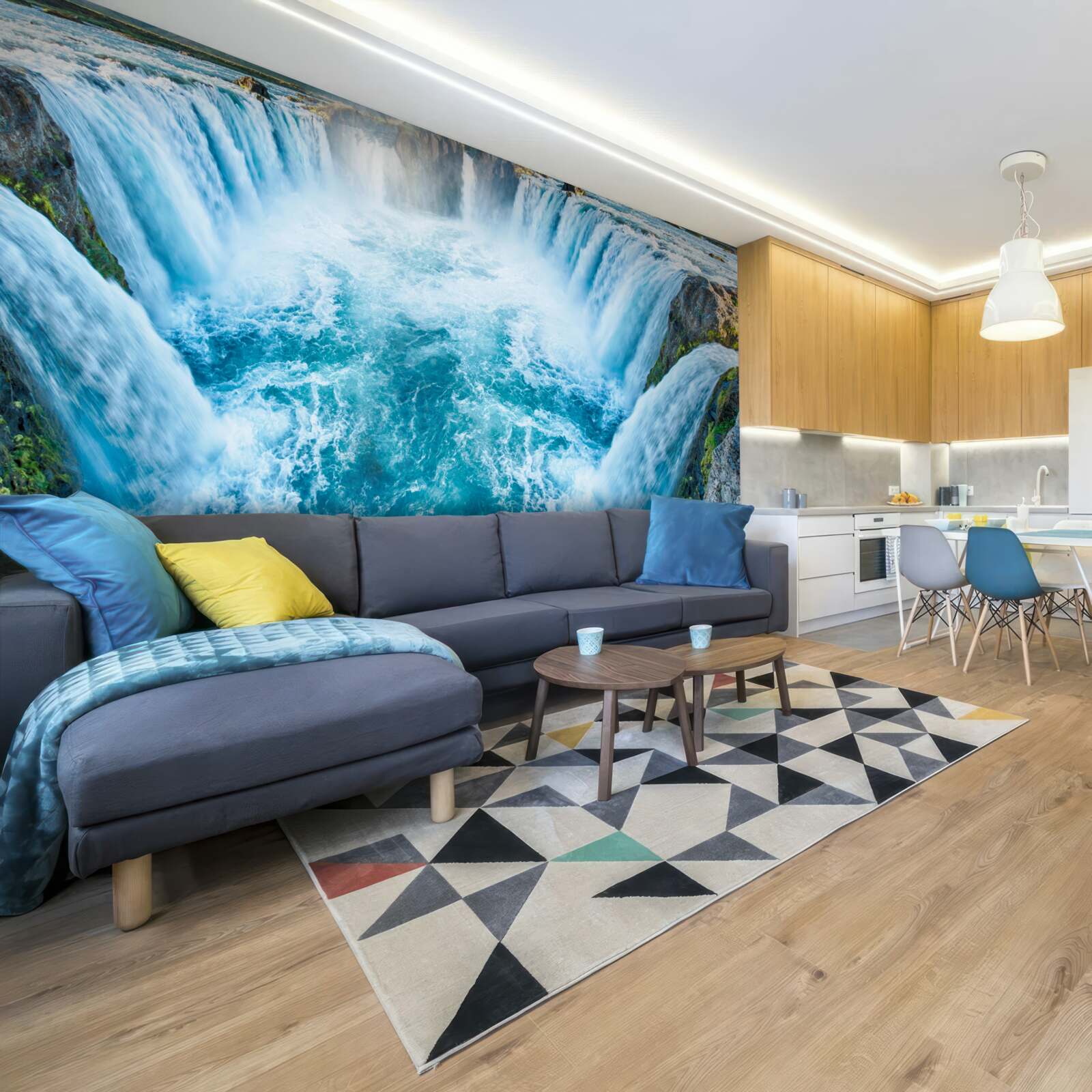 Fotobehang een reeks watervallen die in de rivier storten