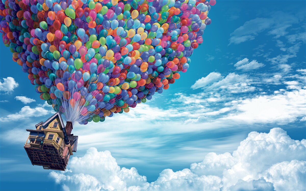 Fotobehang een huis met veel vliegende ballen