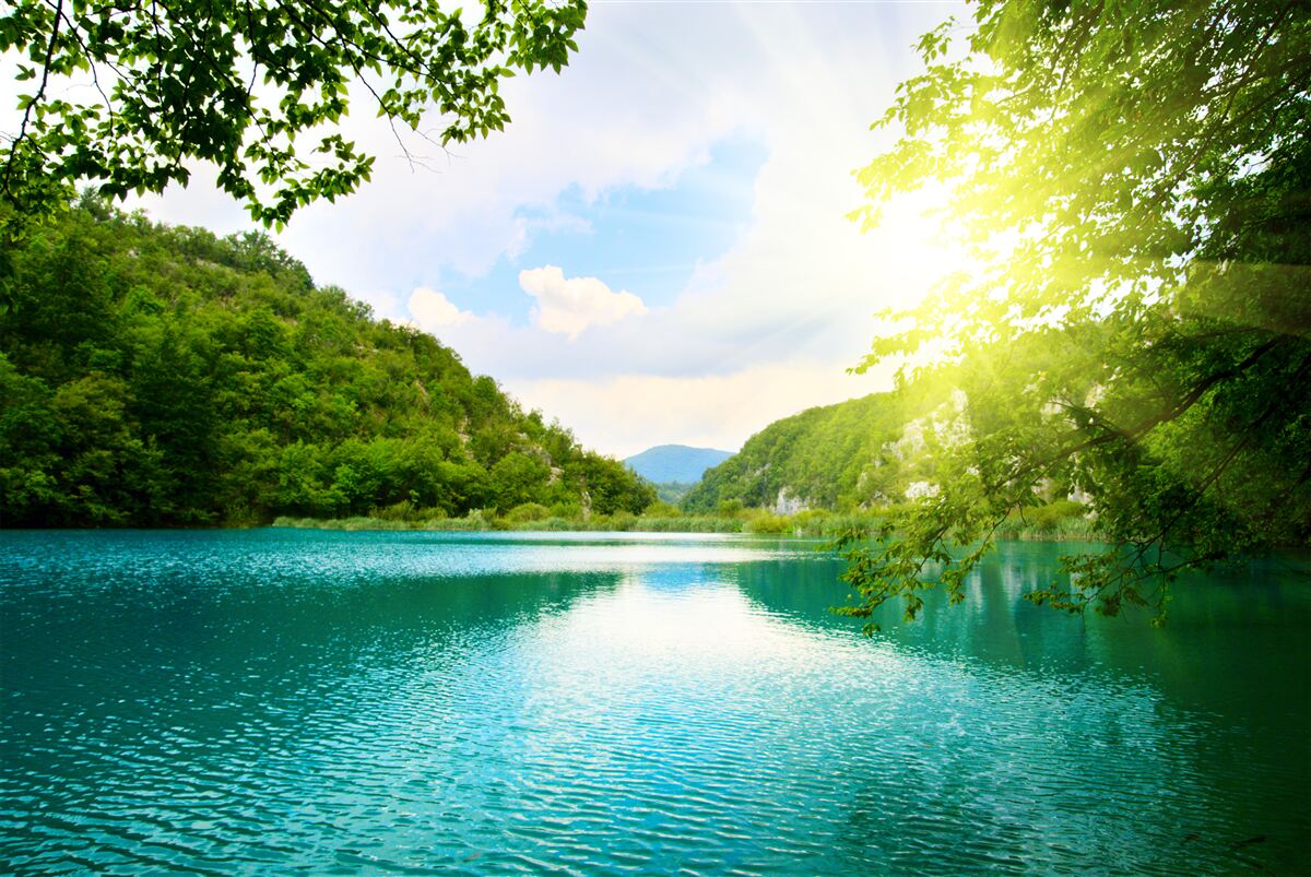 Fotobehang zonsopgang boven het wateroppervlak