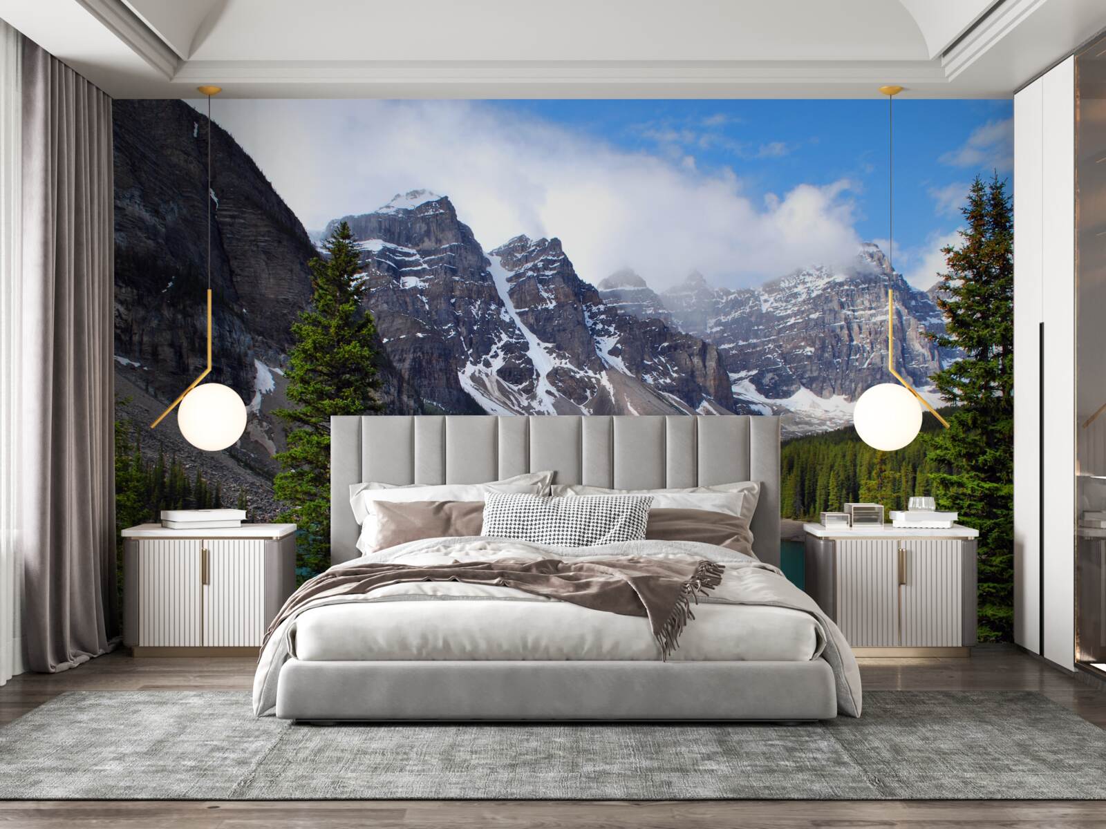 Fotobehang een meer met blauw water aan de voet van bergtoppen