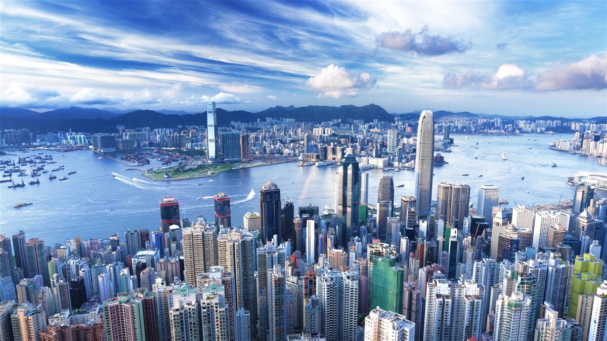 Fotobehang wolkenkrabbers in de haven van victoria