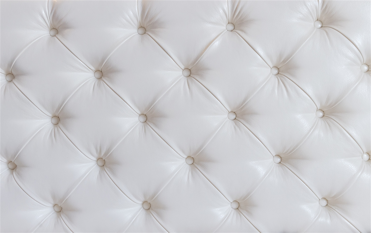 Fotobehang bekleding van wit leer met strass decoratie