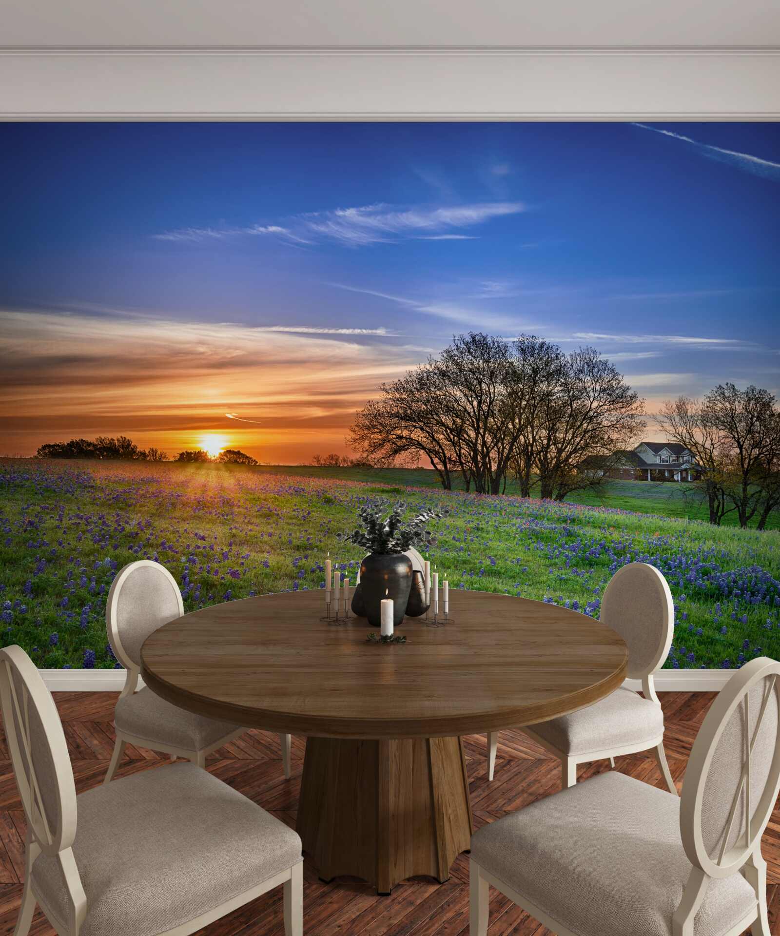 Fotobehang de zon gaat onder boven een veld bezaaid met bloemen
