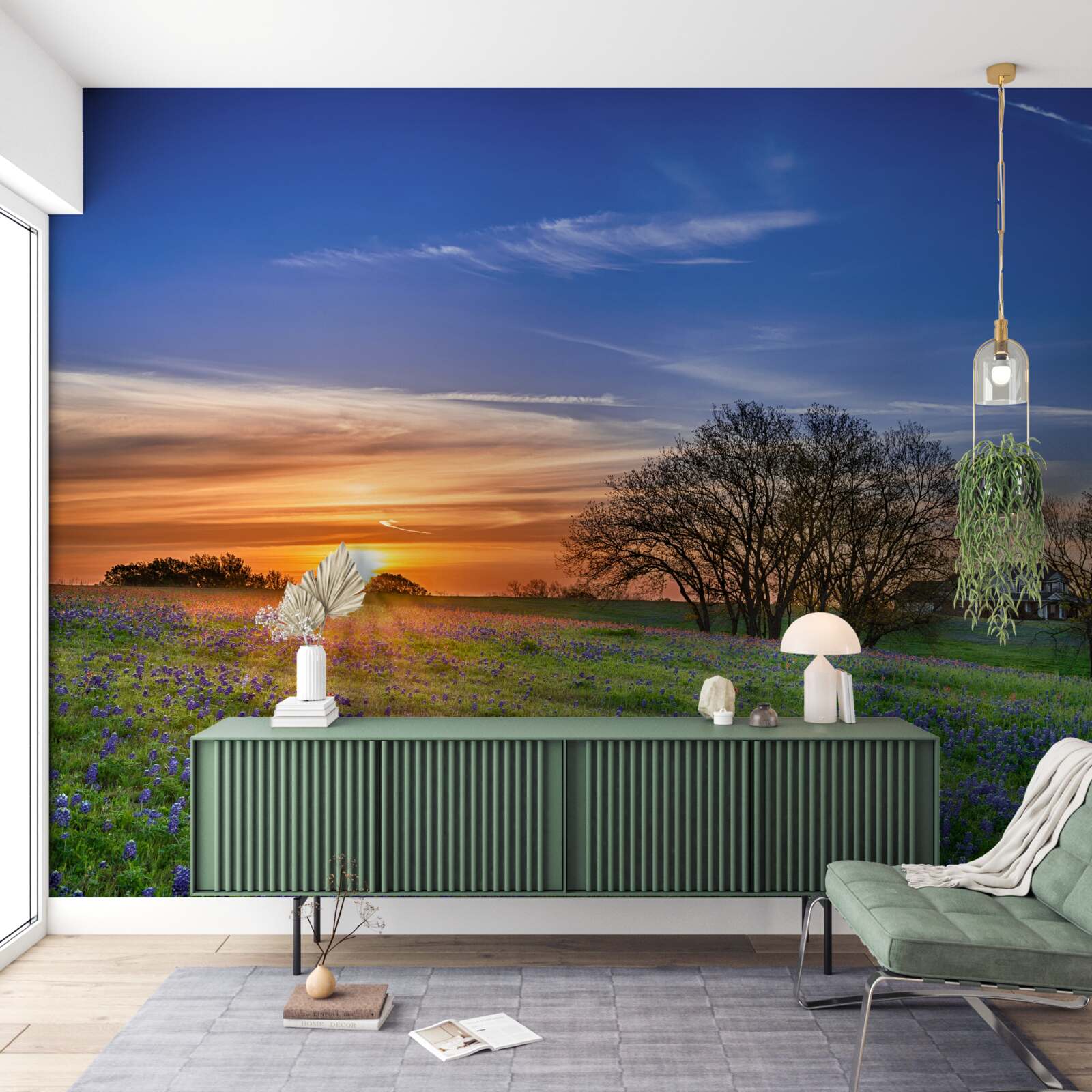 Fotobehang de zon gaat onder boven een veld bezaaid met bloemen