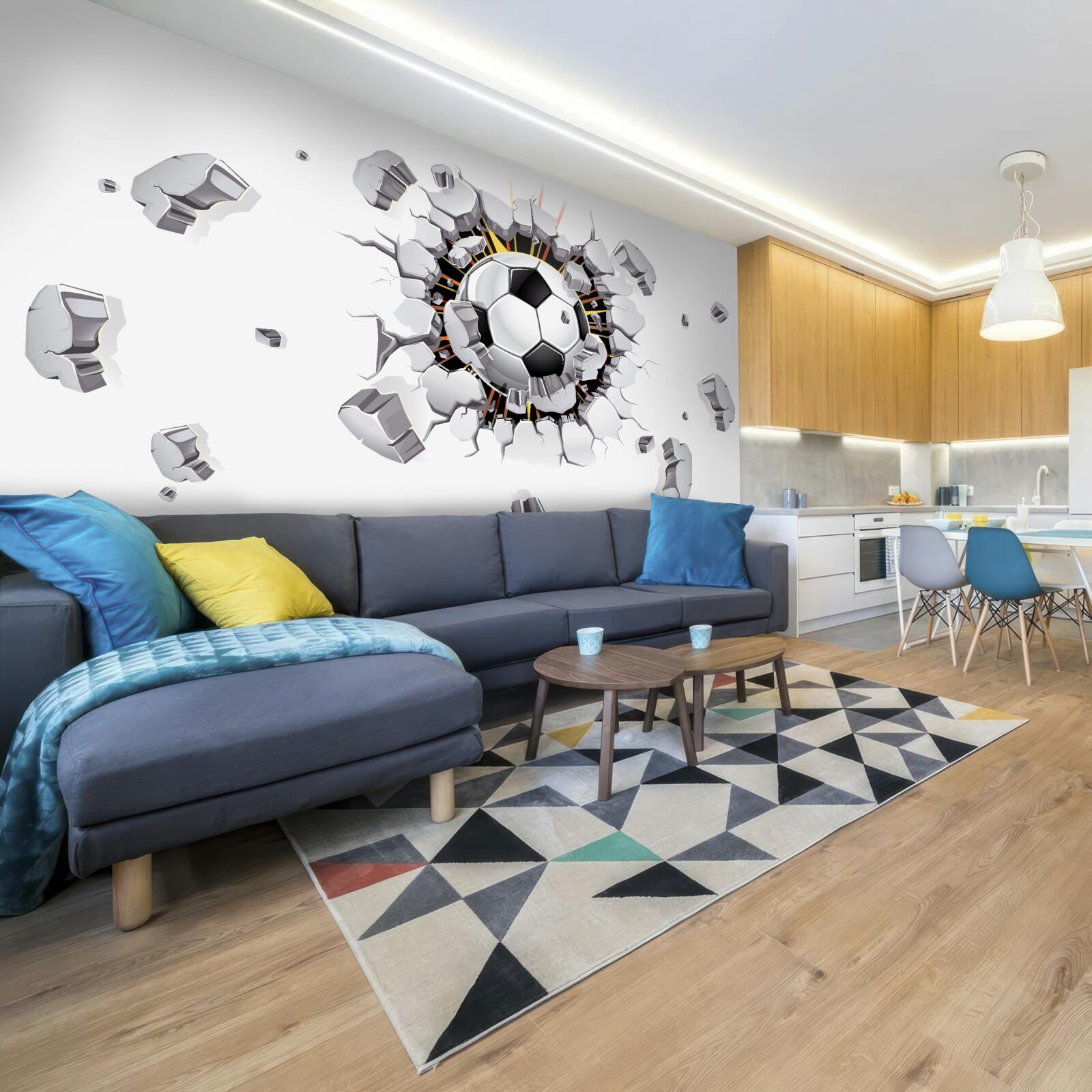 Fotobehang De muur werd doorboord met een voetbal