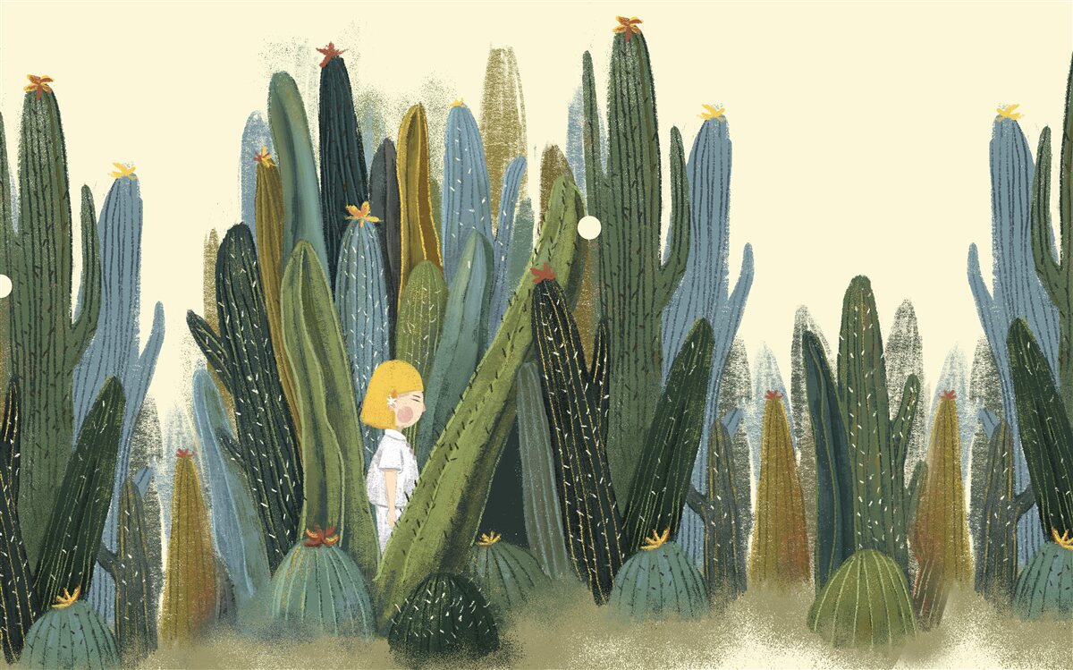 Fotobehang meisje met rood haar tussen de cactussen