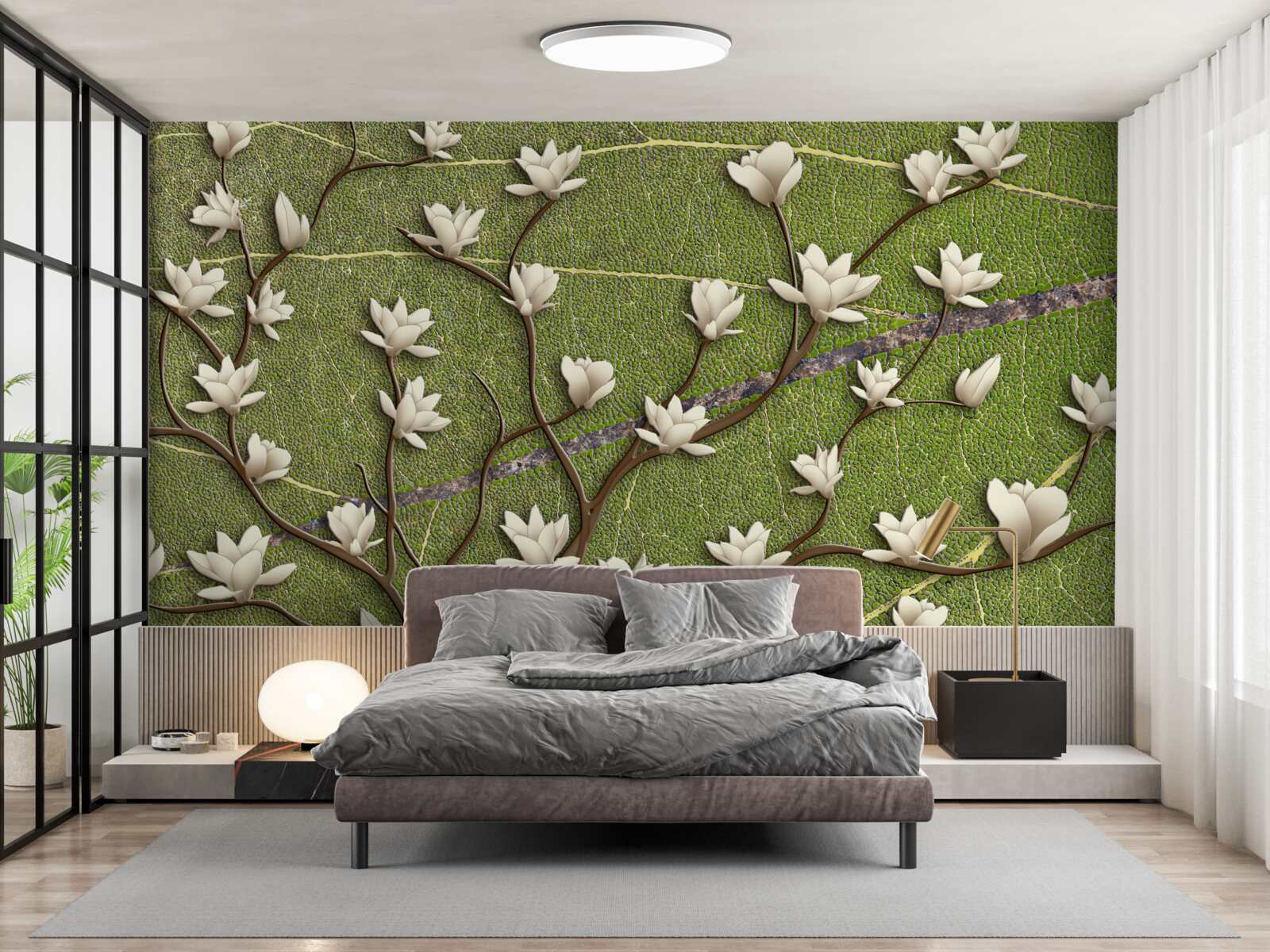 Fotobehang Sneeuwwitte magnolia takken op een groene achtergrond