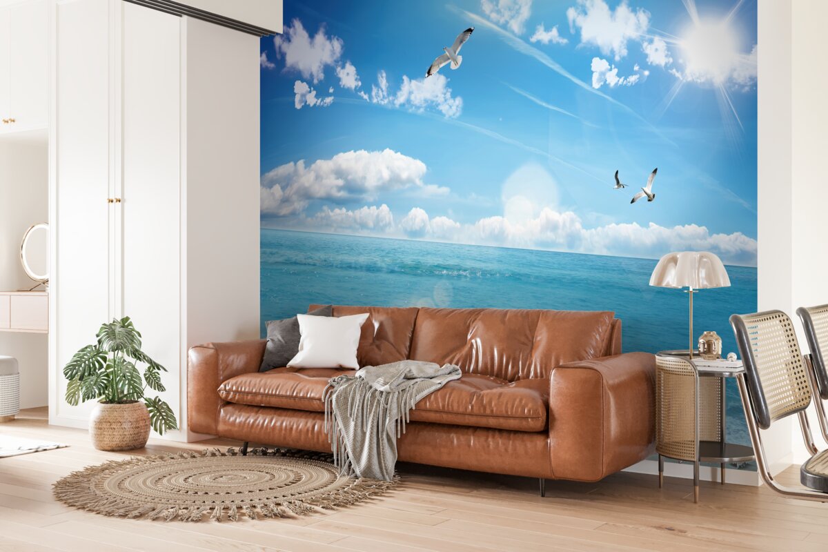 Fotobehang meeuwen boven blauwe golven