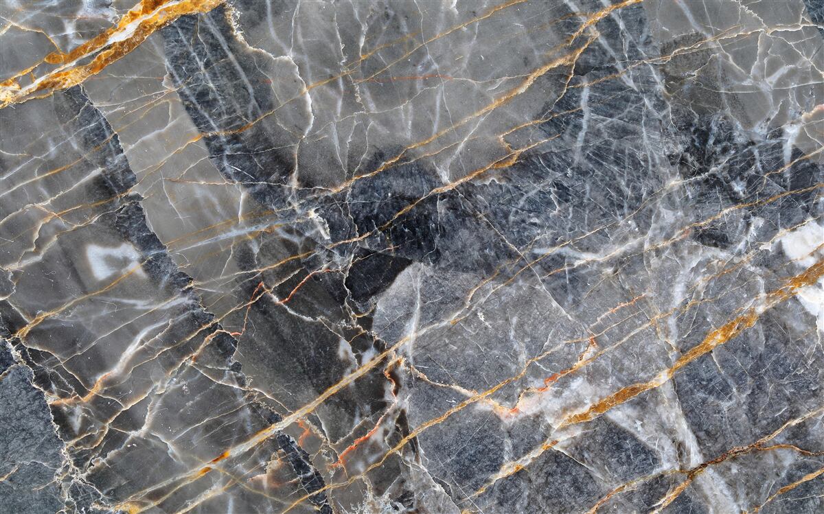 Fotobehang zwart marmer met goud dooraderd