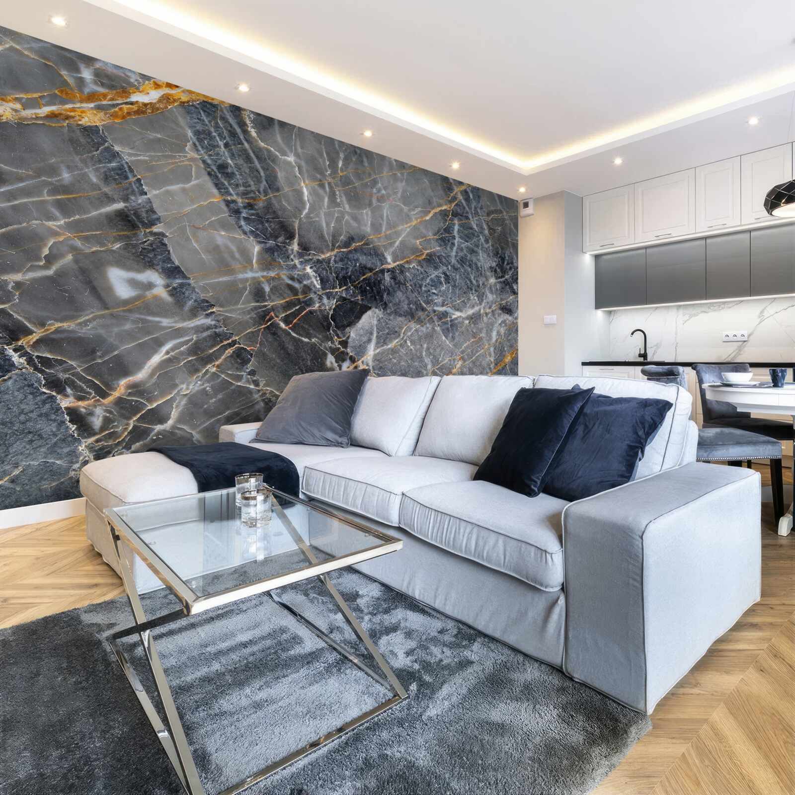 Fotobehang zwart marmer met goud dooraderd