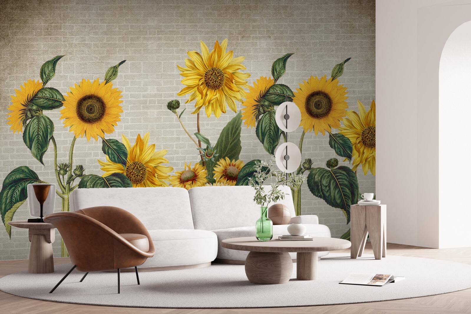 Fotobehang Bakstenen muur met zonnebloemen op de voorgrond