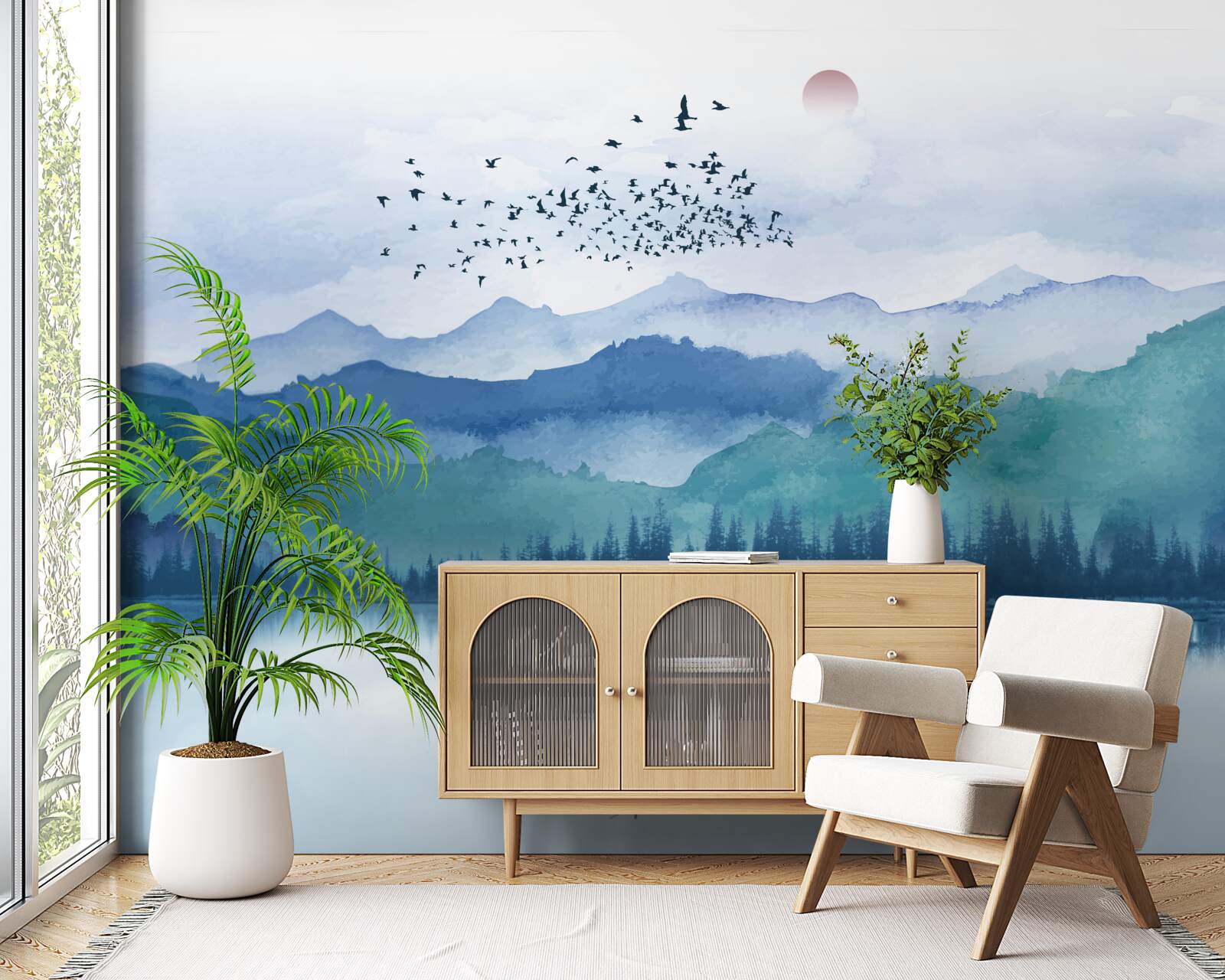 Fotobehang een zwerm vogels zwermt over een bergmeer tegen de achtergrond van de ondergaande zon