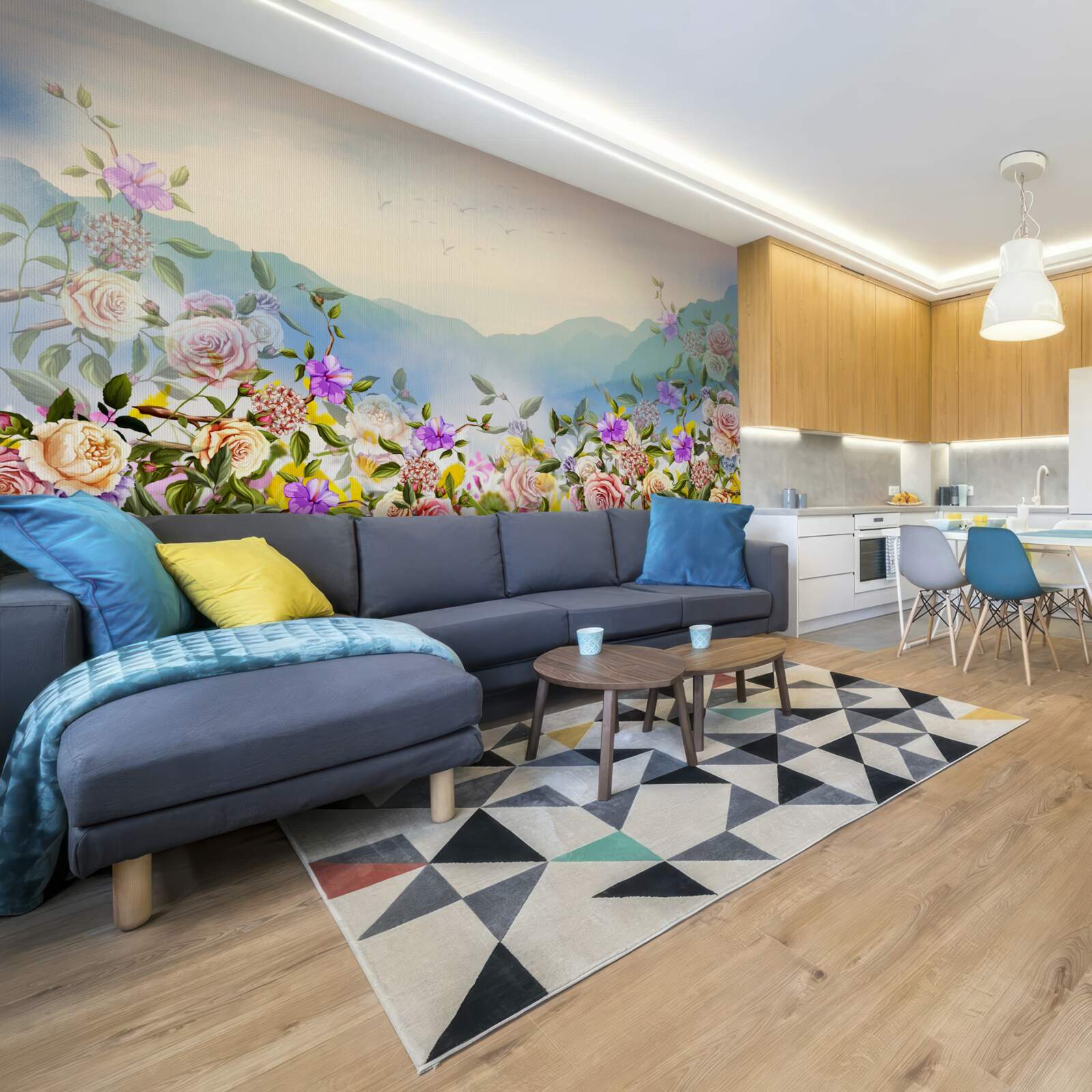 Fotobehang verschillende bloeiende tinten op het gazon