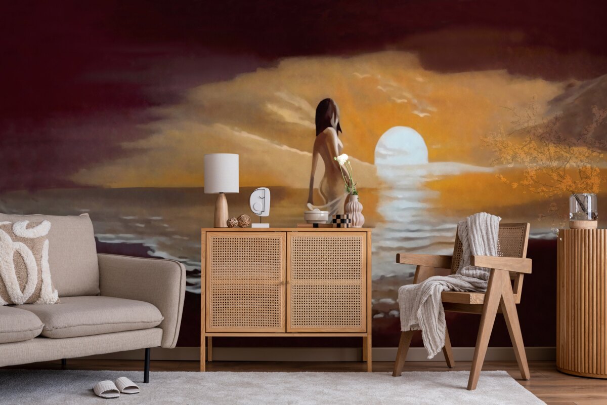 Fotobehang meisje kijkt naar zonsondergang boven de kust