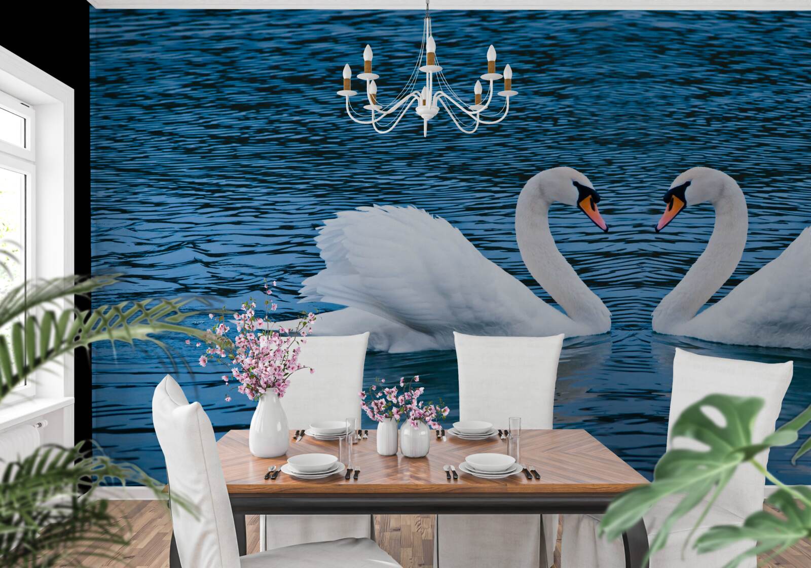 Fotobehang een zwanenpaar op het wateroppervlak creëert een idyllisch familieplaatje