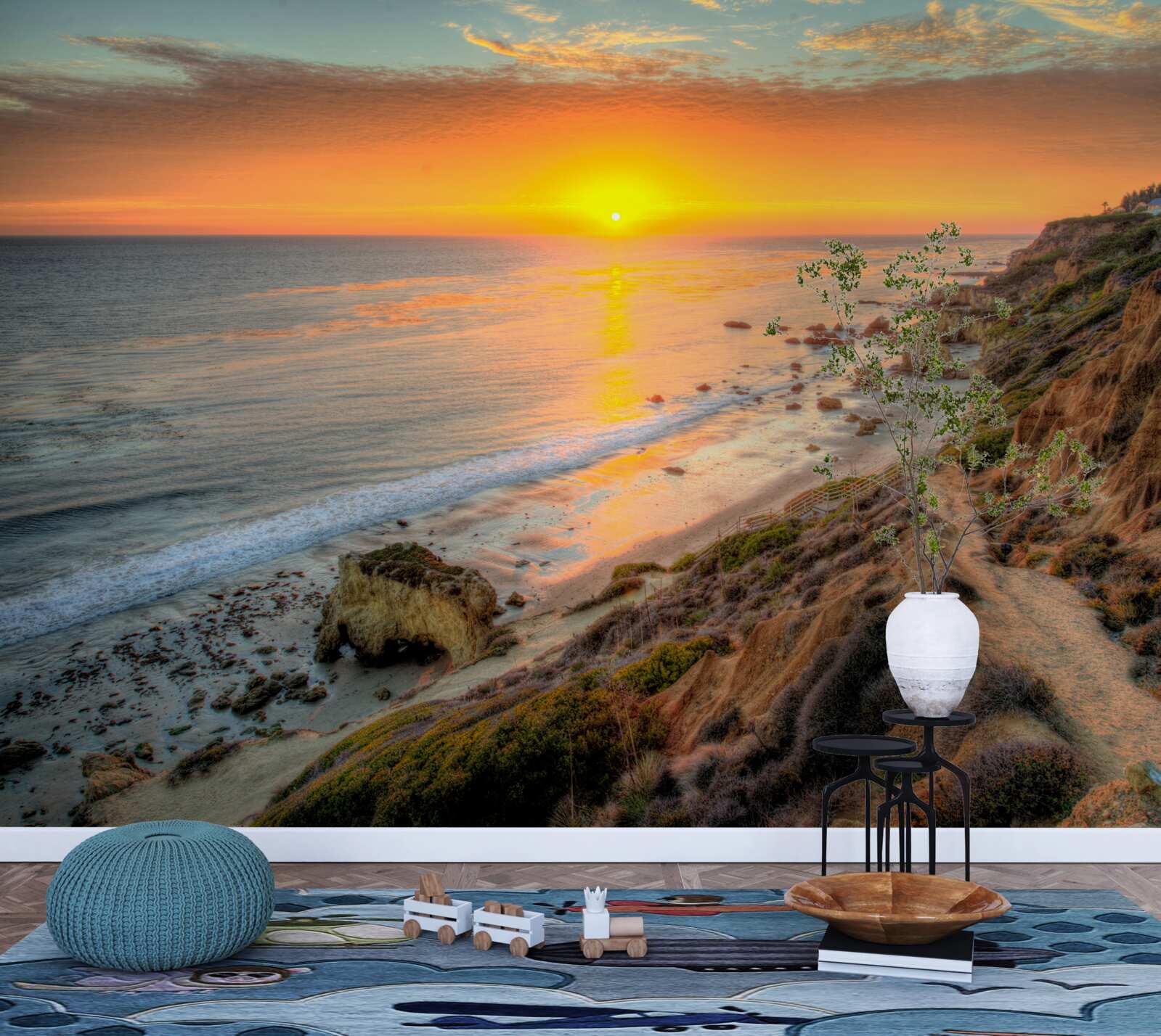 Fotobehang de zon die ondergaat in de oceaan bij zonsondergang