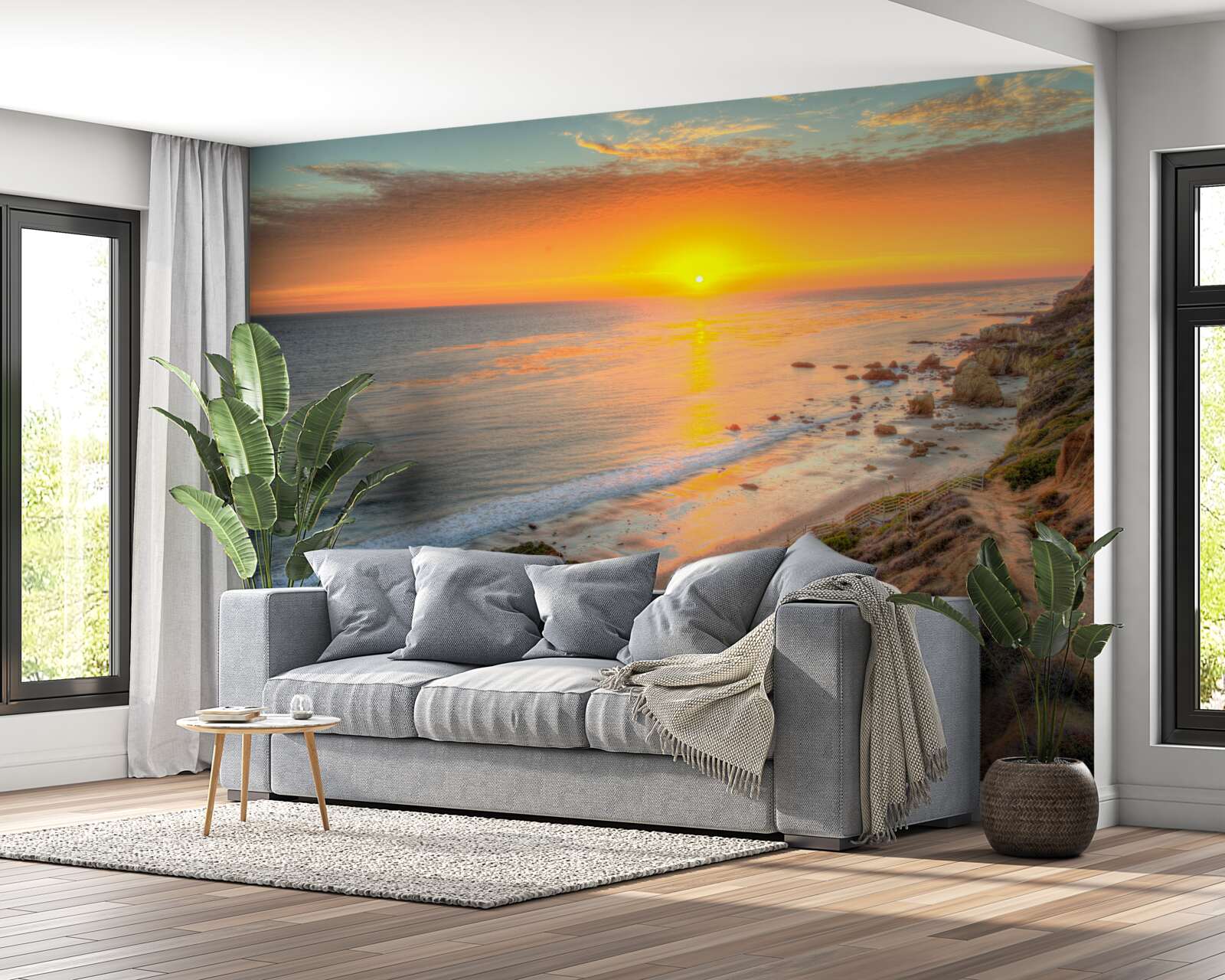 Fotobehang de zon die ondergaat in de oceaan bij zonsondergang