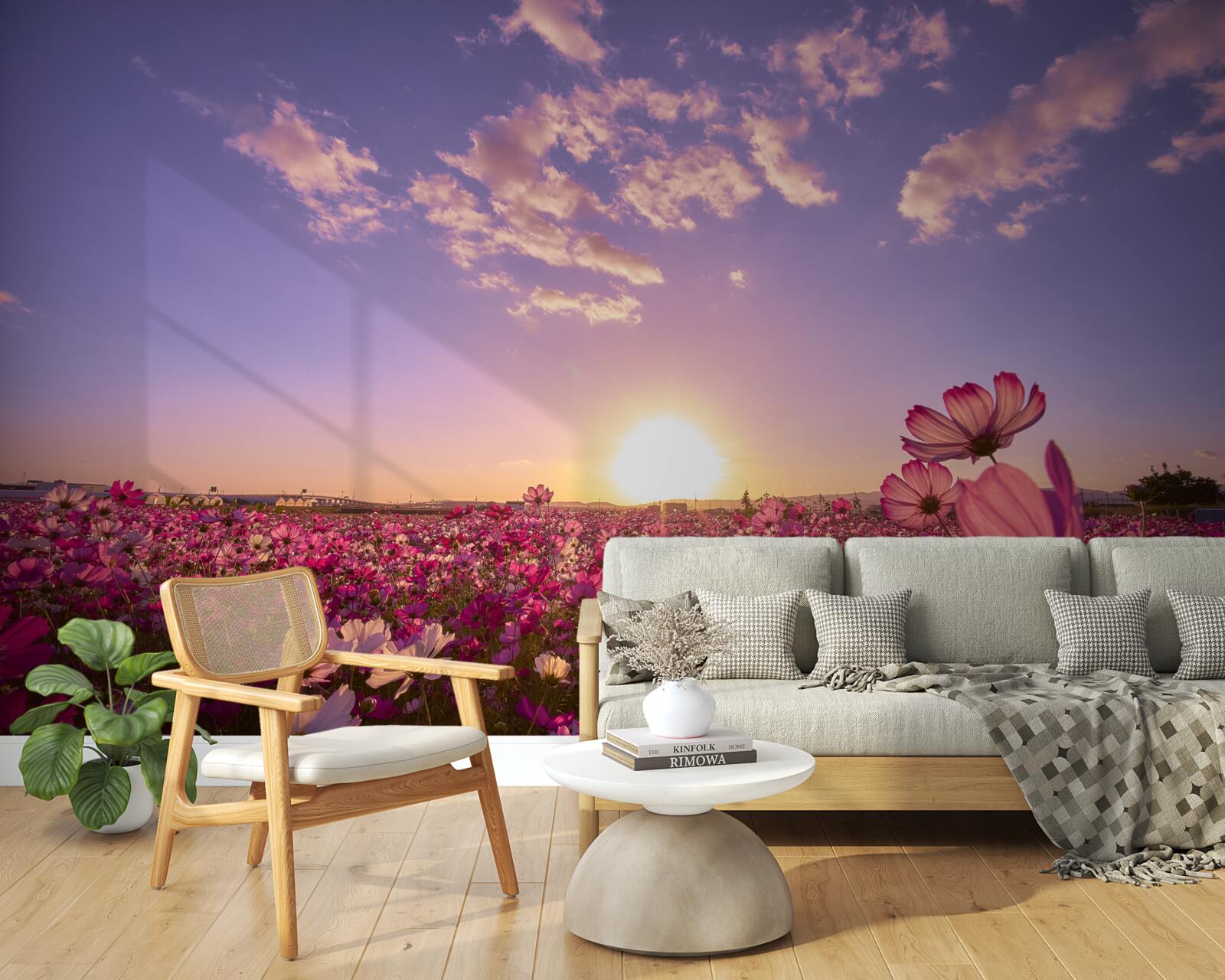 Fotobehang Dageraad boven een veld vol bloemen