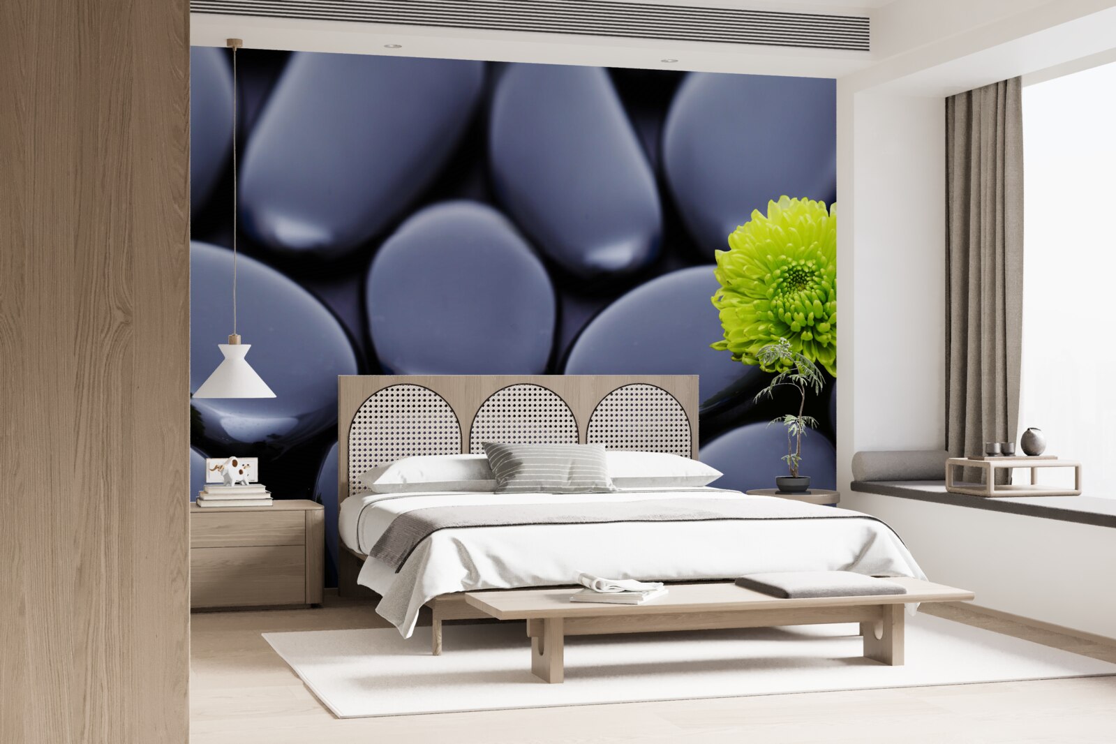 Fotobehang een groene bloem groeit over een rotsachtige barrière